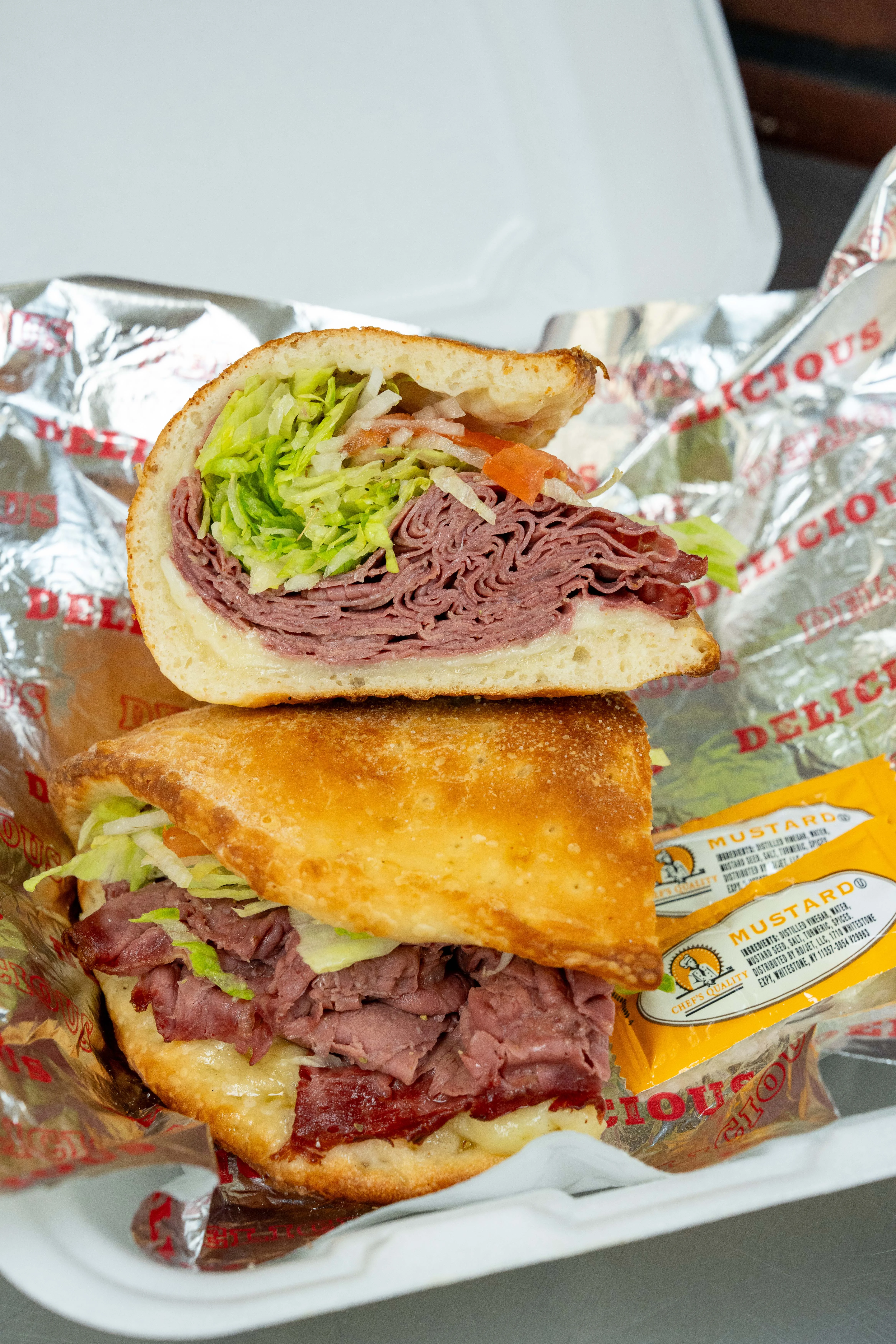 Classic Italian roast beef sandwich with lettuce and tomato