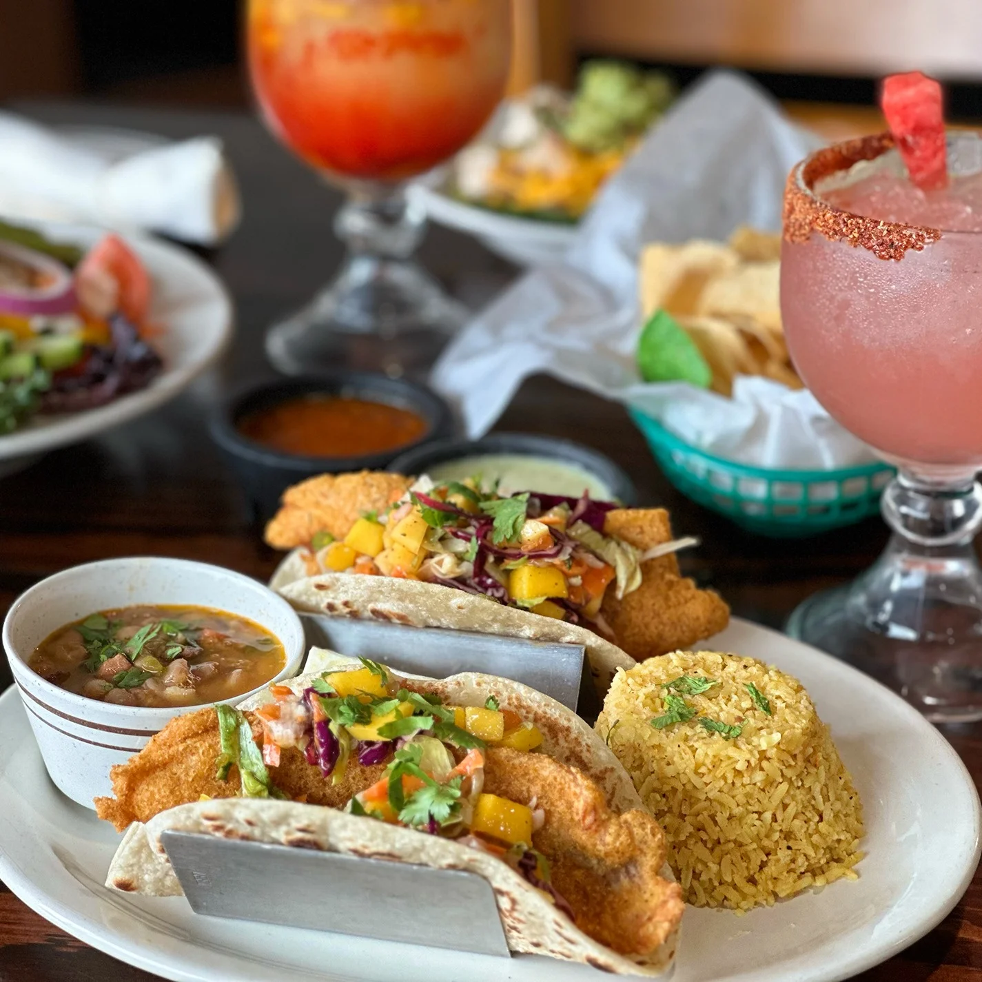 Crispy fish tacos with mango salsa and rice