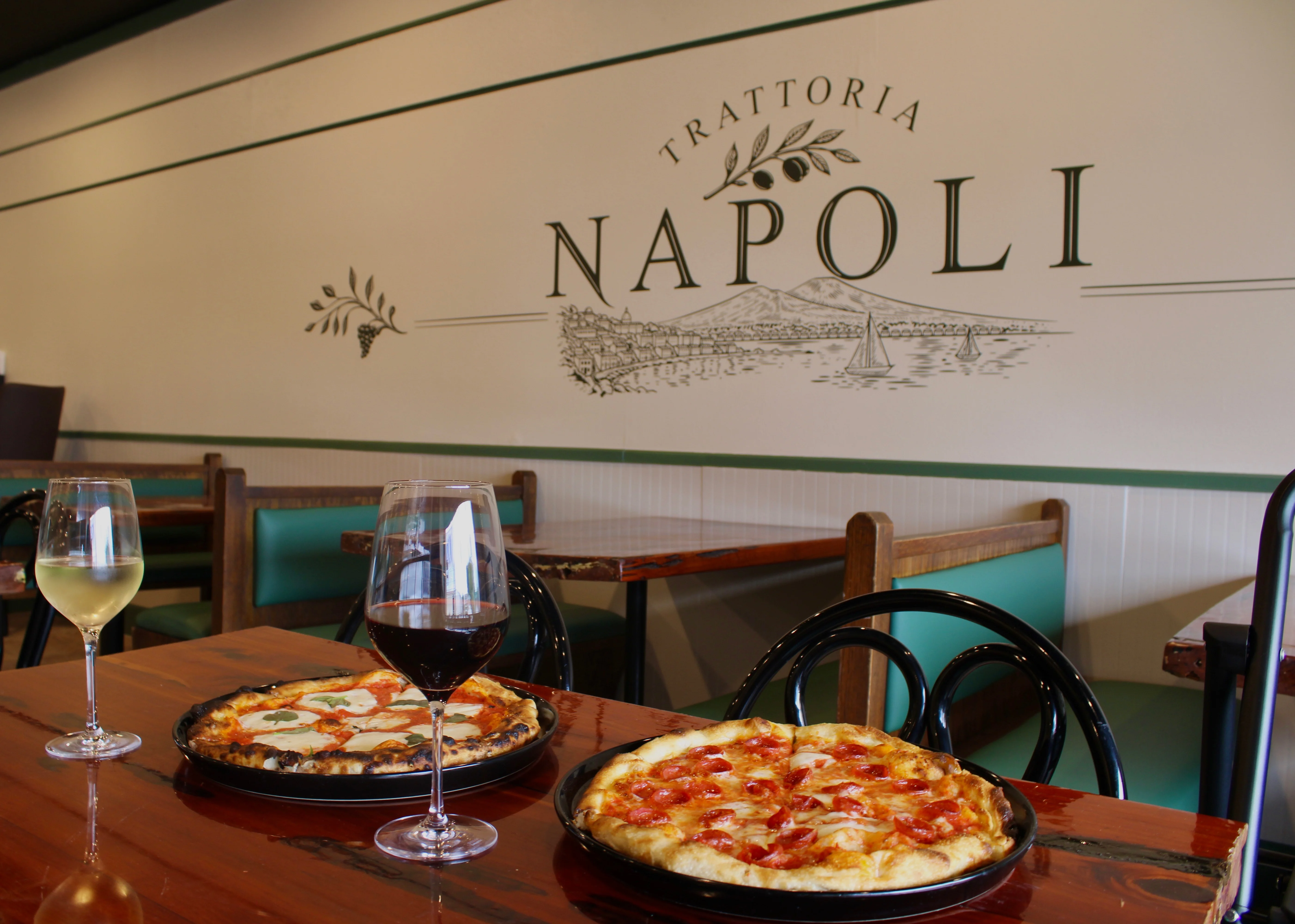 Cozy trattoria with Margherita and pepperoni pizzas