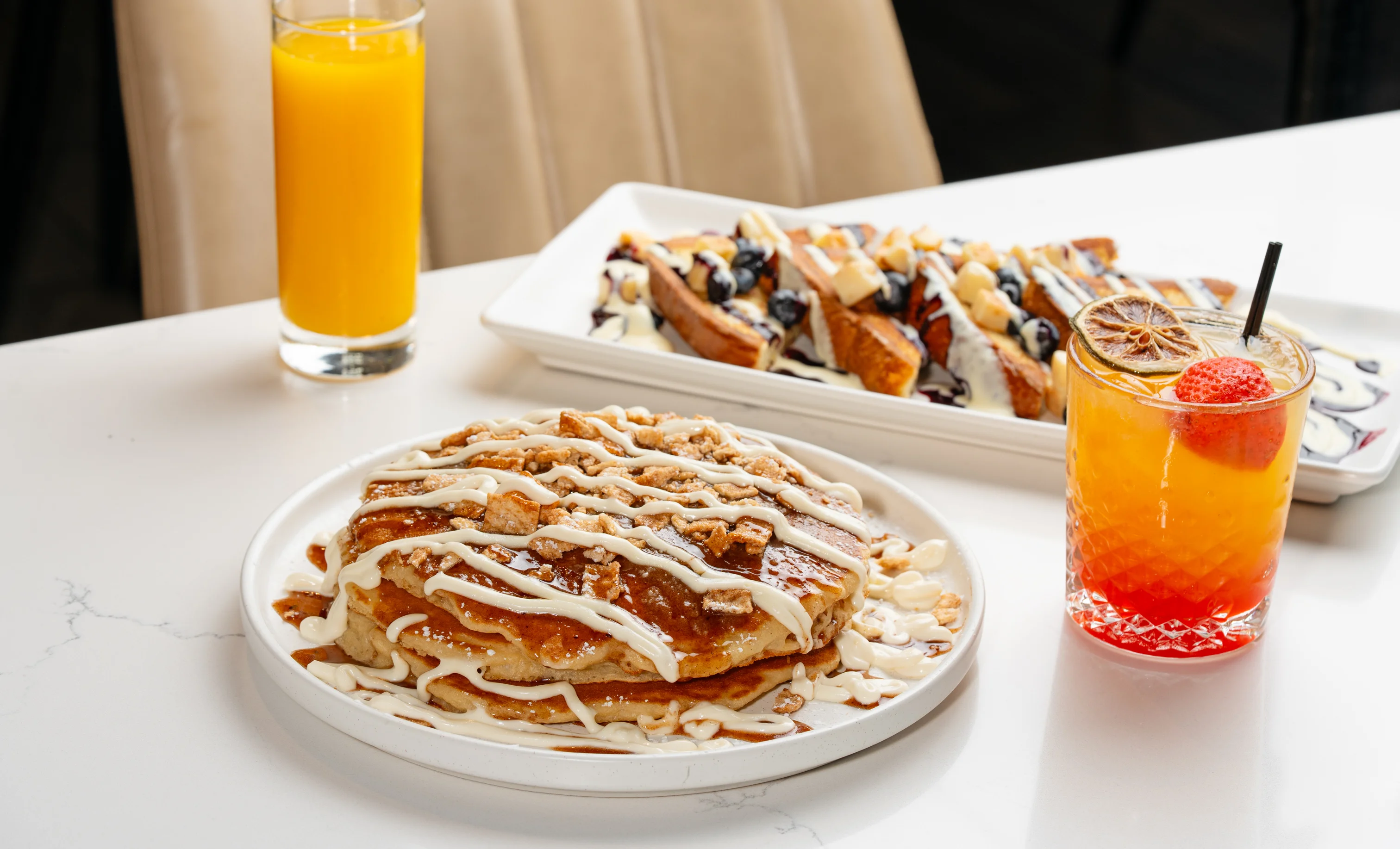 Stack of chocolate chip pancakes with syrup
