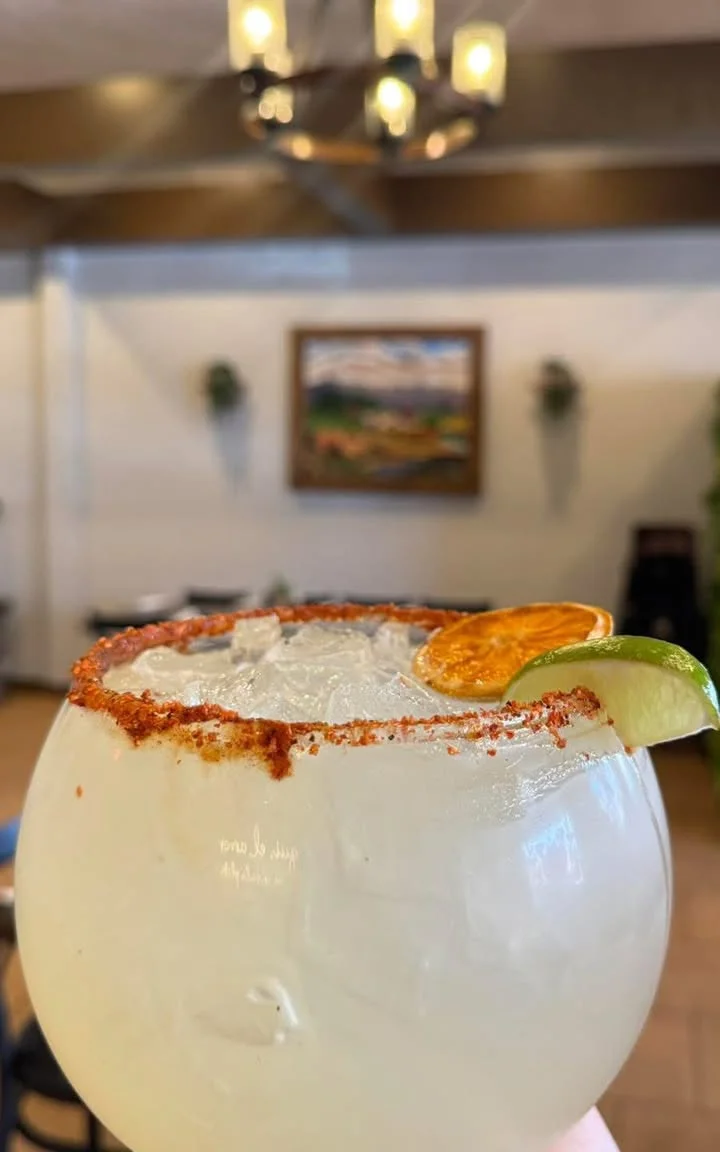 Refreshing margarita cocktail with lime and chili rim