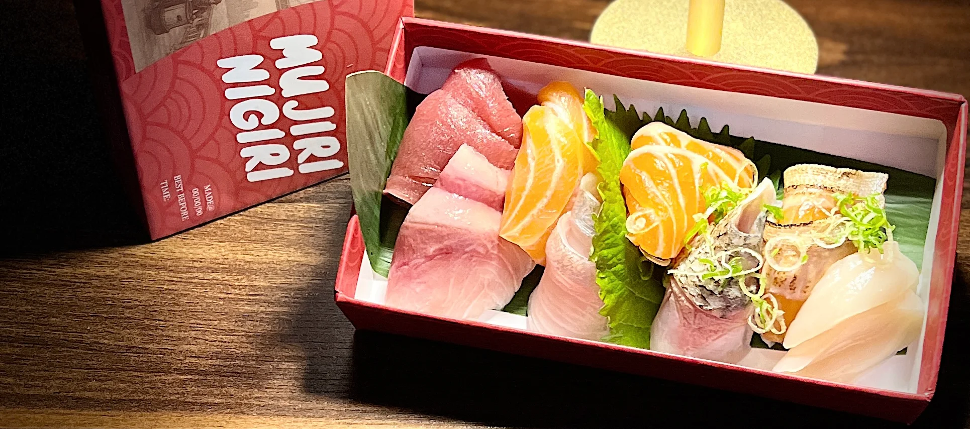 Assorted Japanese nigiri sushi in a decorative box