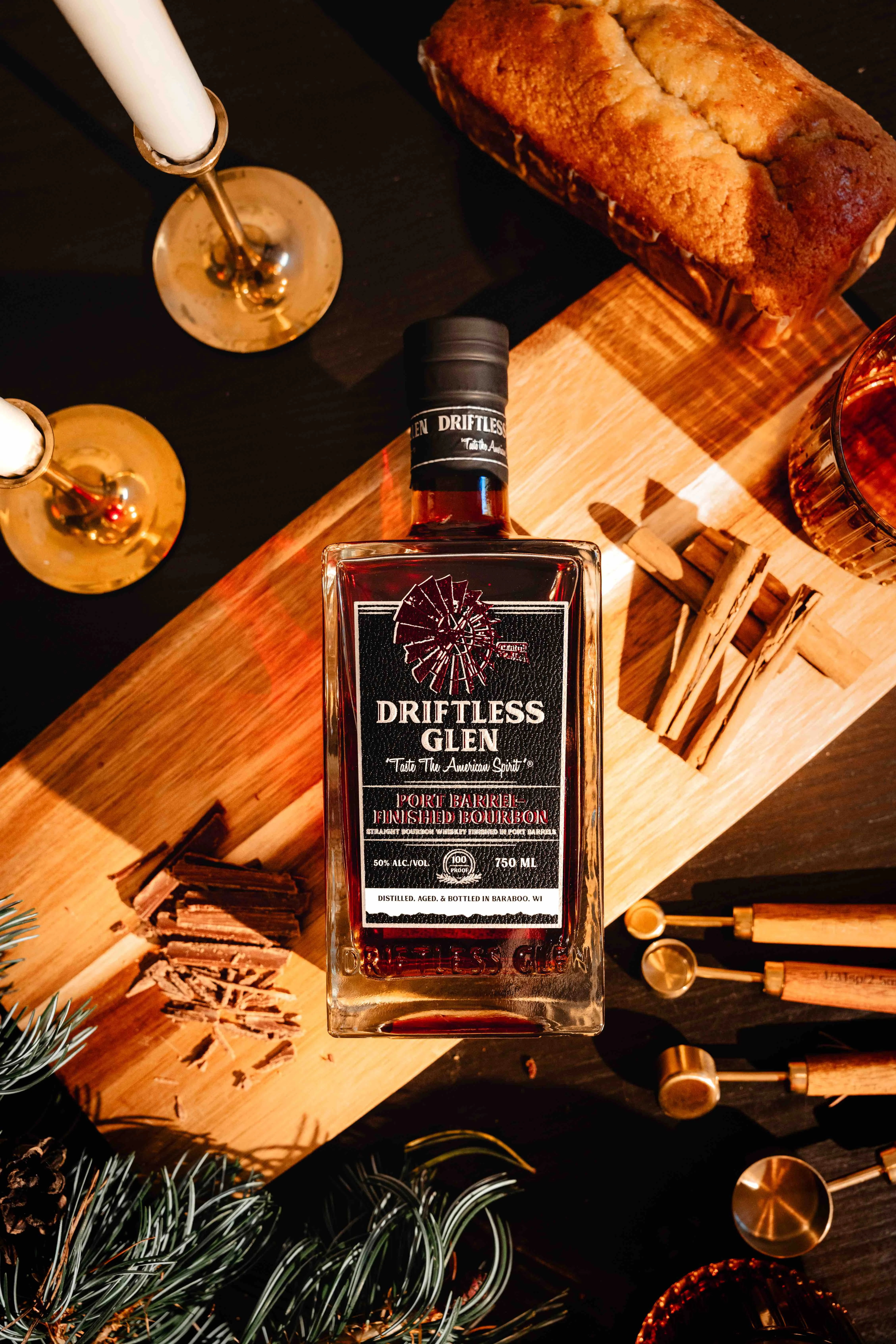 A bottle of Port-Finished bourbon sits on a kitchen with holiday decor