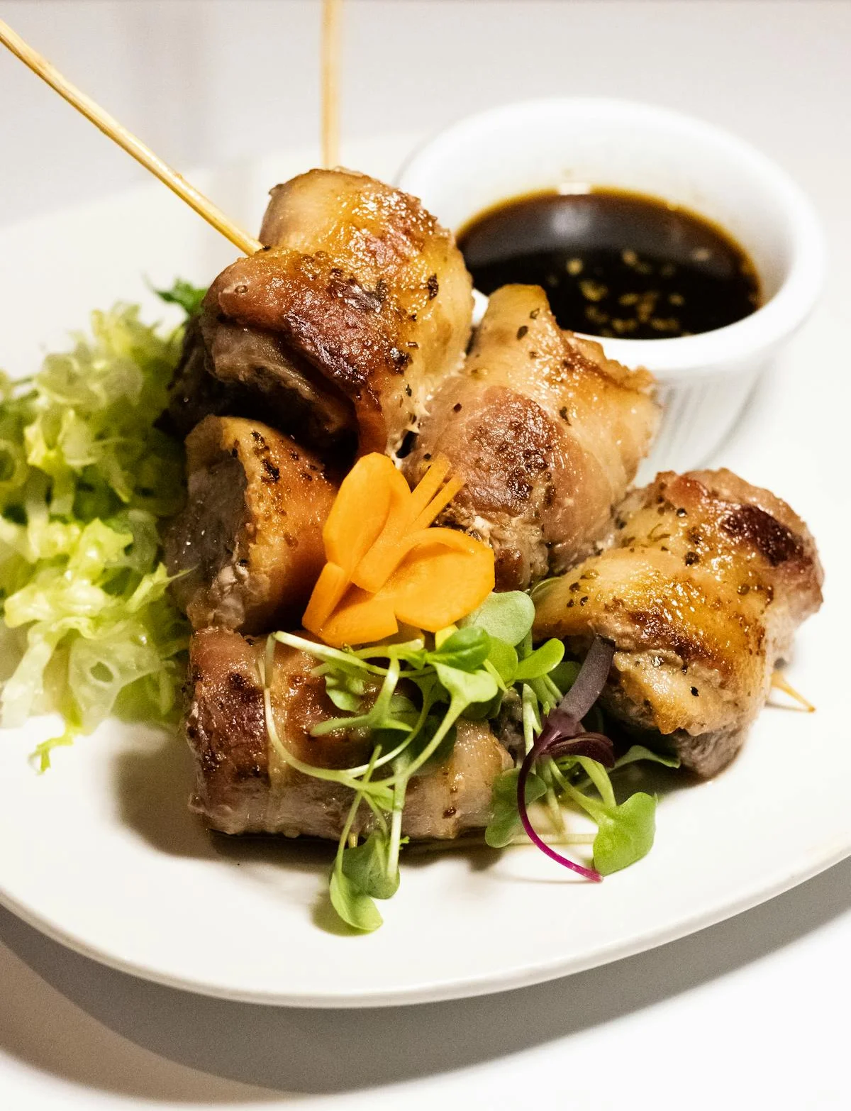 Grilled Vietnamese pork skewers with fresh herbs