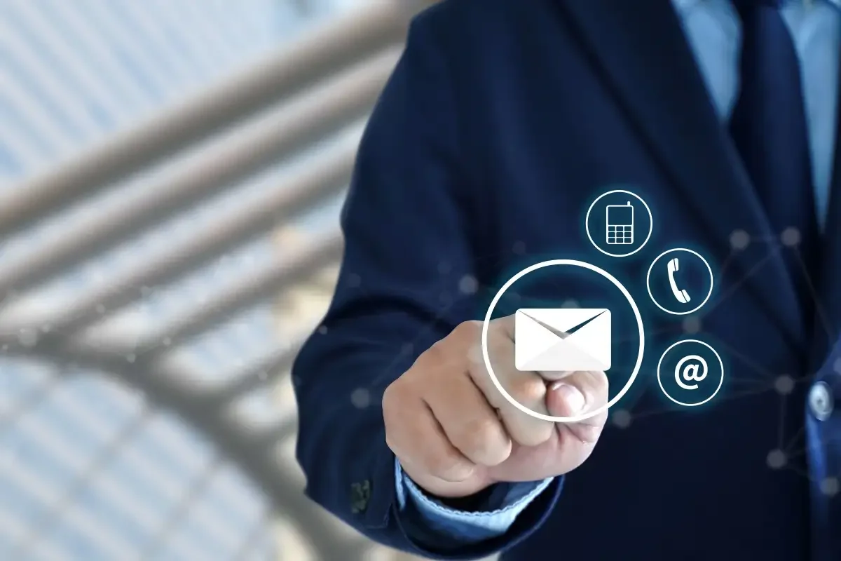 Businessman interacting with digital communication icons