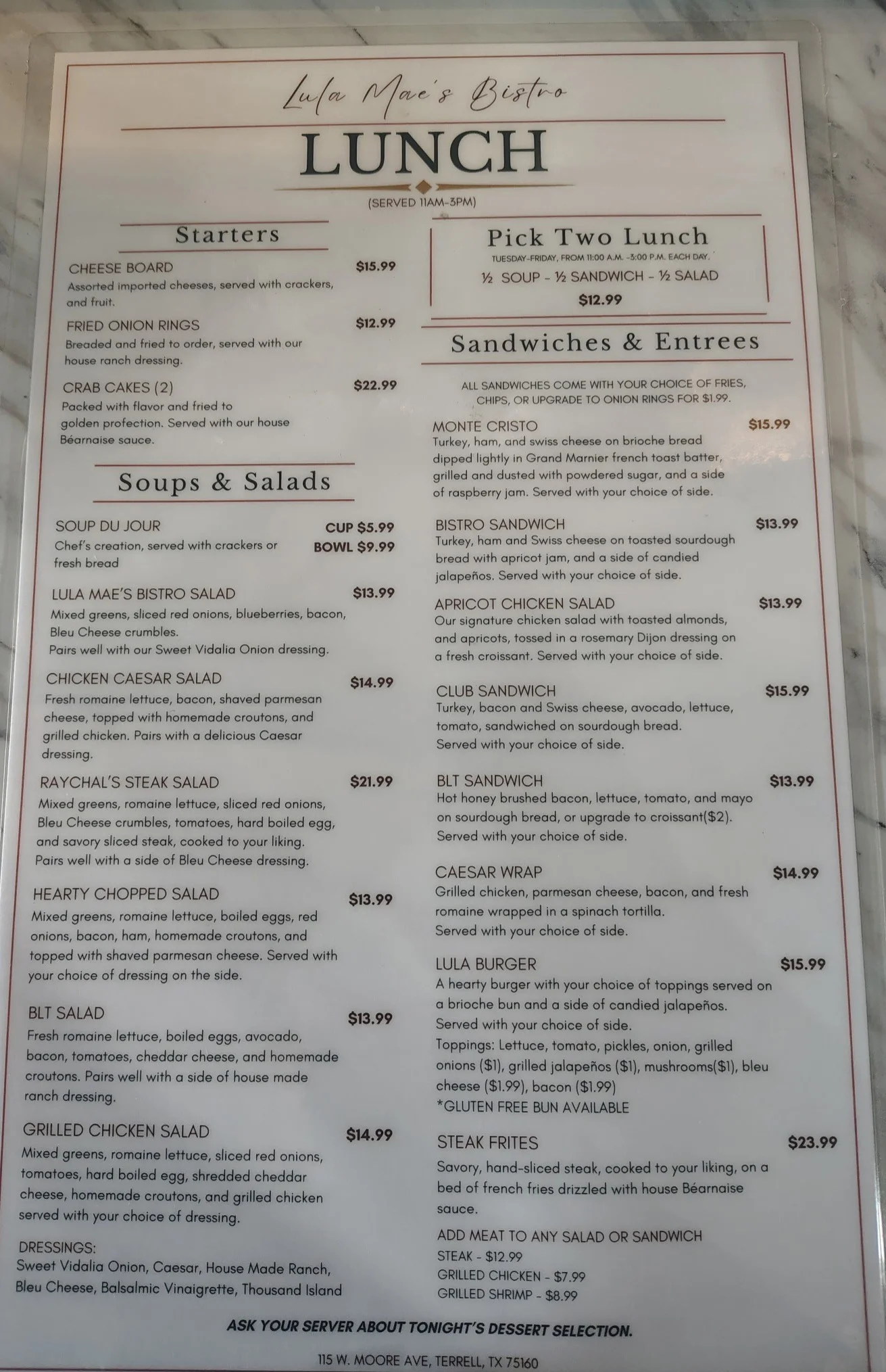 Lunch menu at a bistro featuring various dishes and prices
