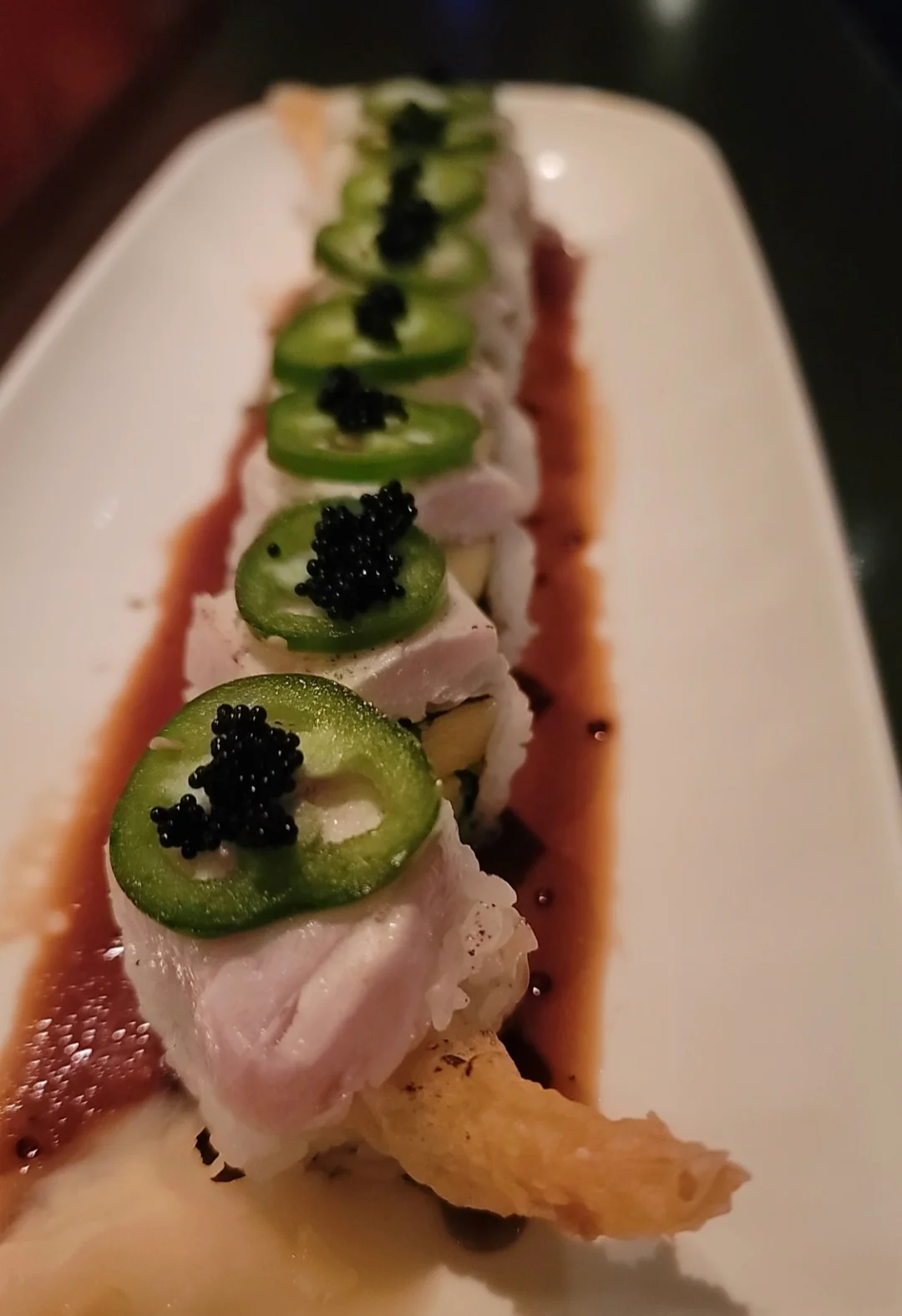 Sushi roll with jalapeño and caviar