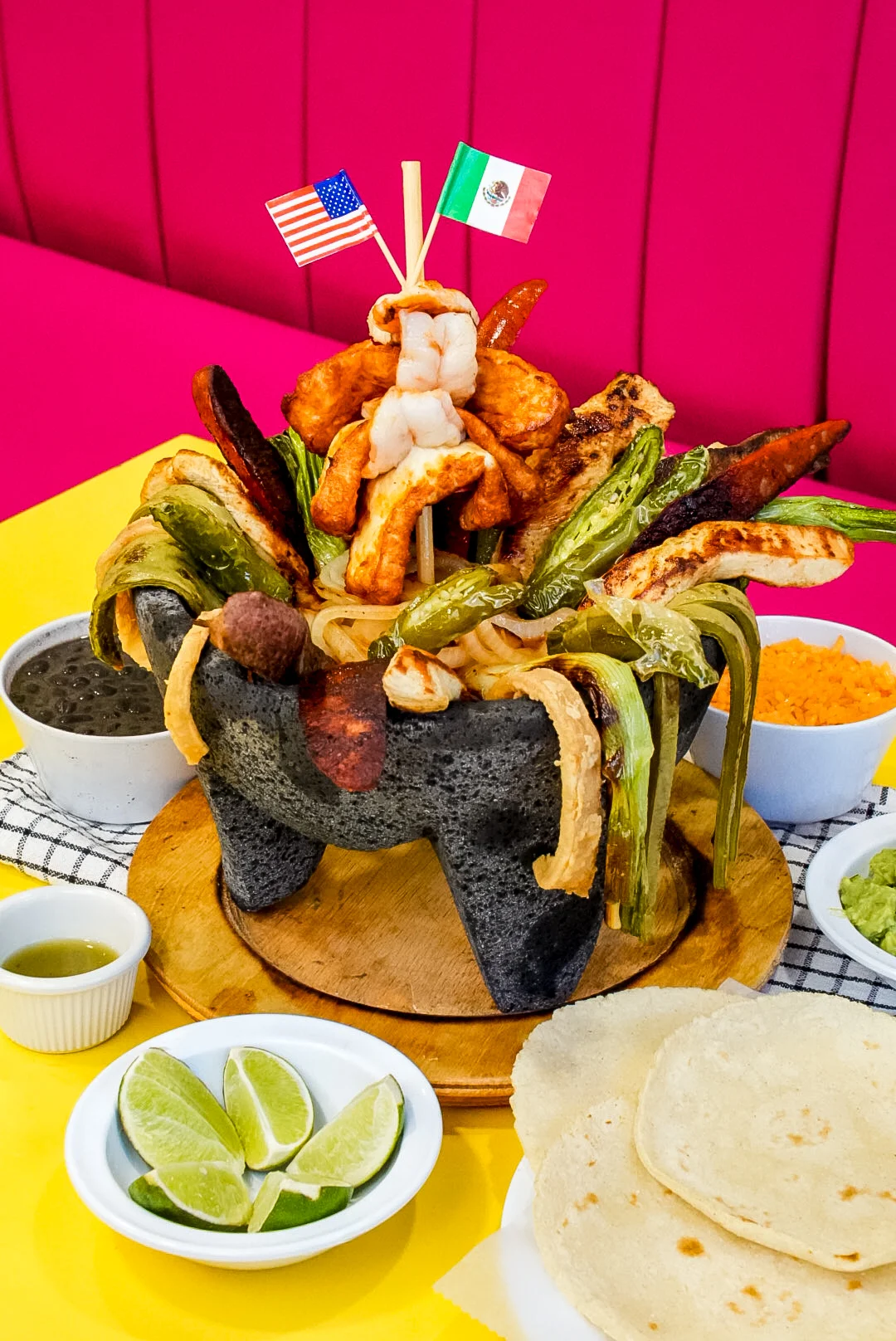 Sizzling Mexican fajitas served in a stone bowl