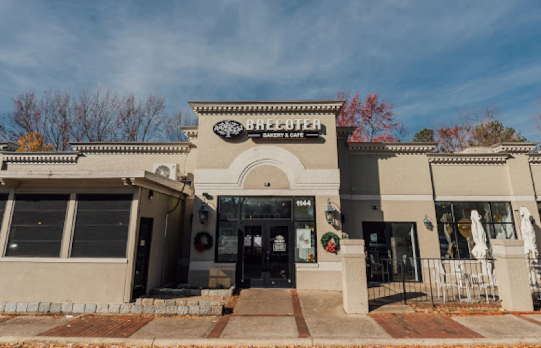 Charming bakery and café exterior with seasonal decor