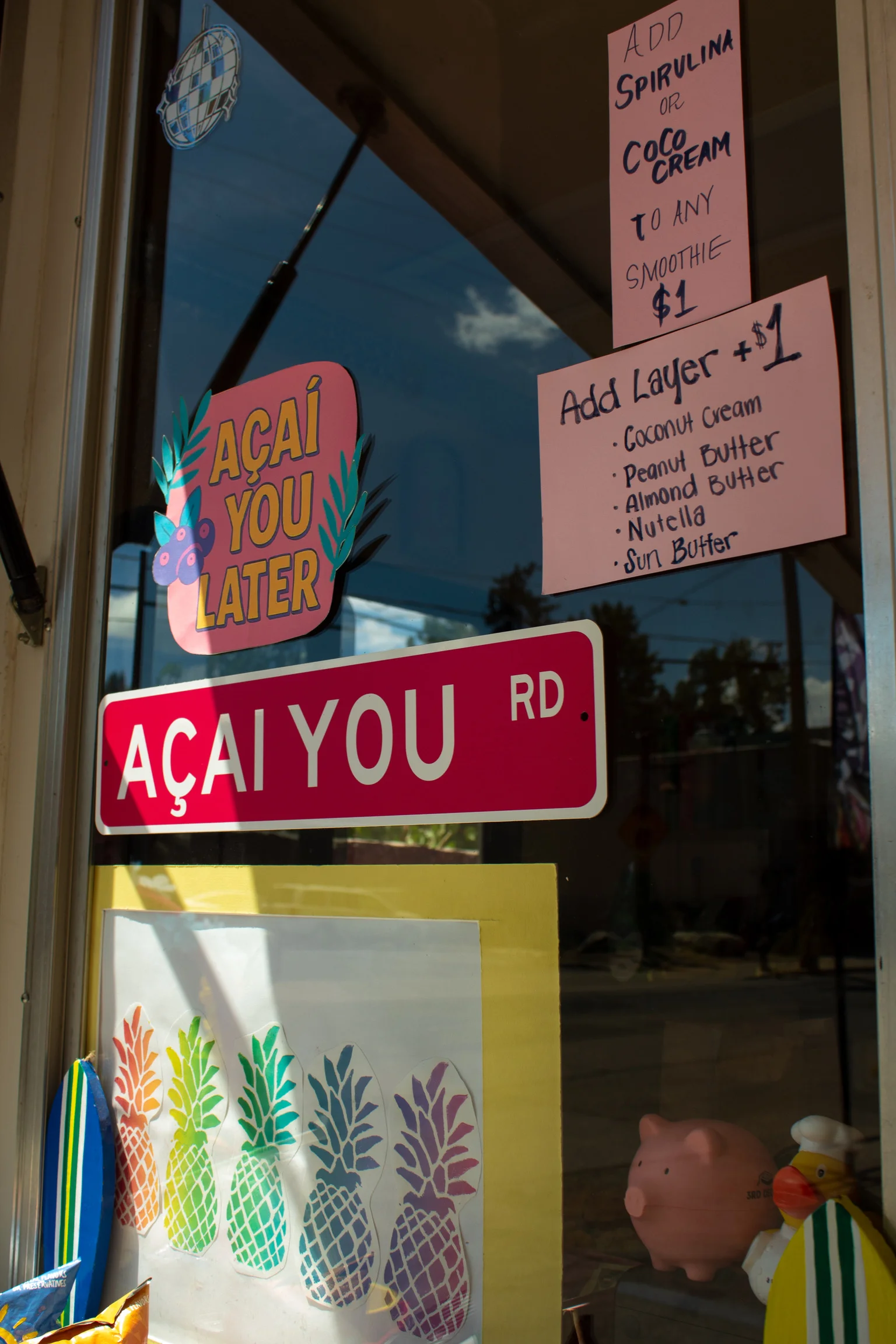 Colorful smoothie shop window with creative signage
