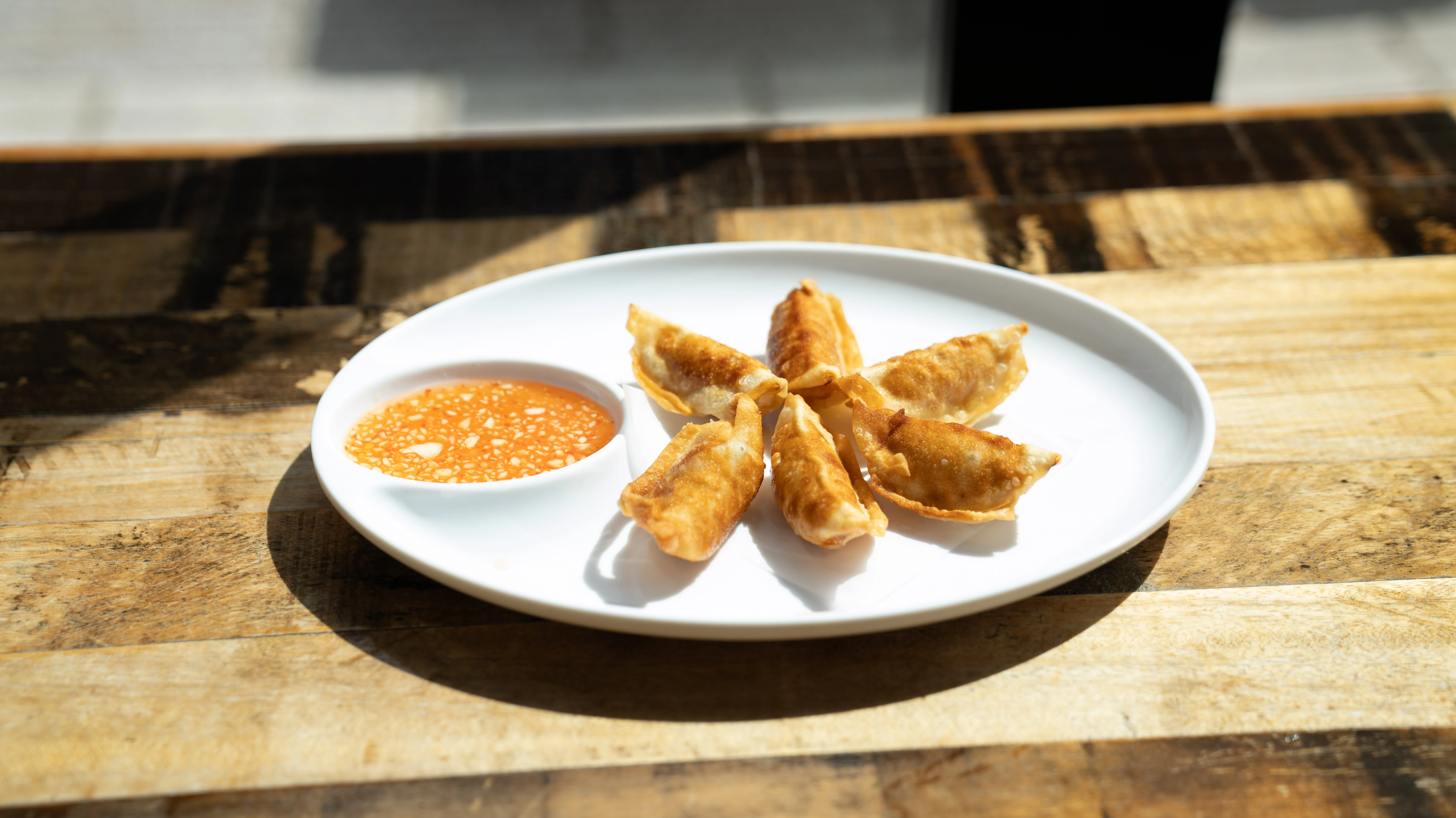 Crispy Chinese potstickers with dipping sauce