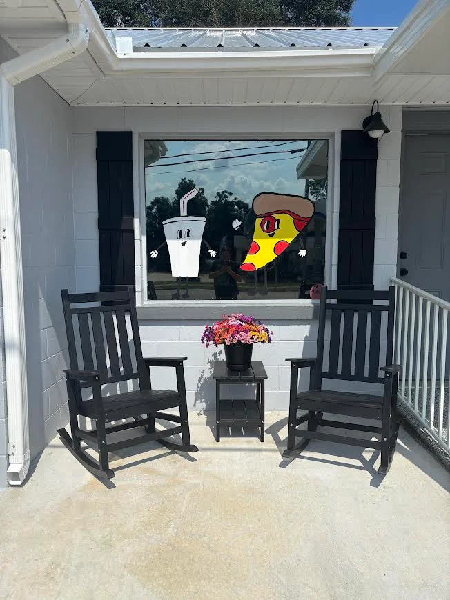Charming restaurant entrance with playful food art