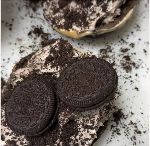 Decadent Oreo cheesecake dessert with cookie crumbles