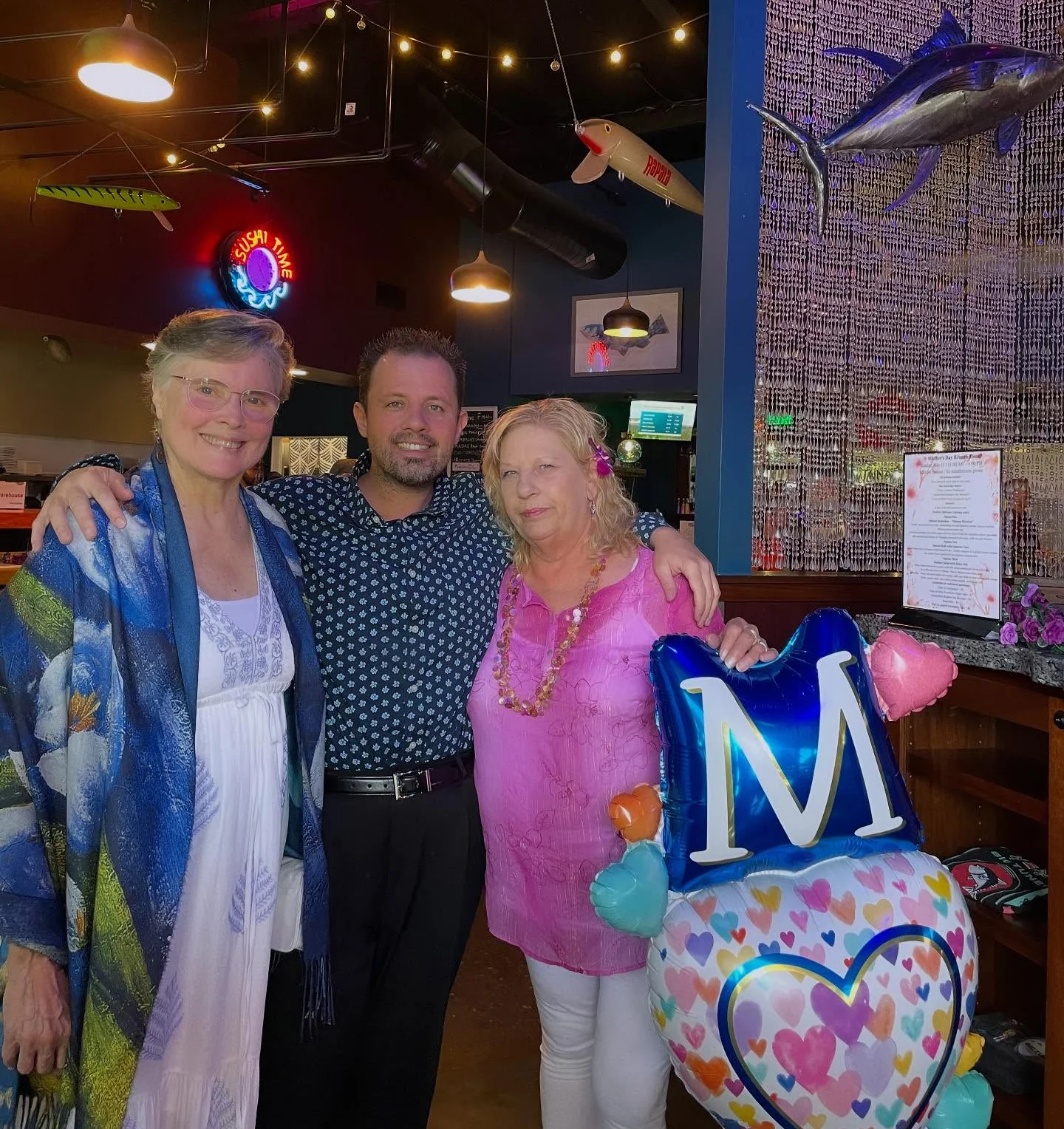 Celebratory gathering in a vibrant restaurant setting