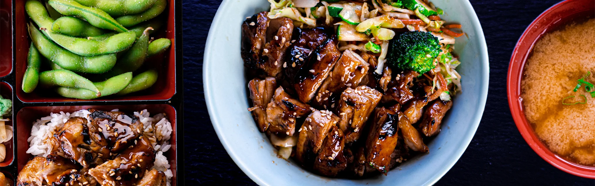 Japanese teriyaki chicken bowl with edamame and miso soup