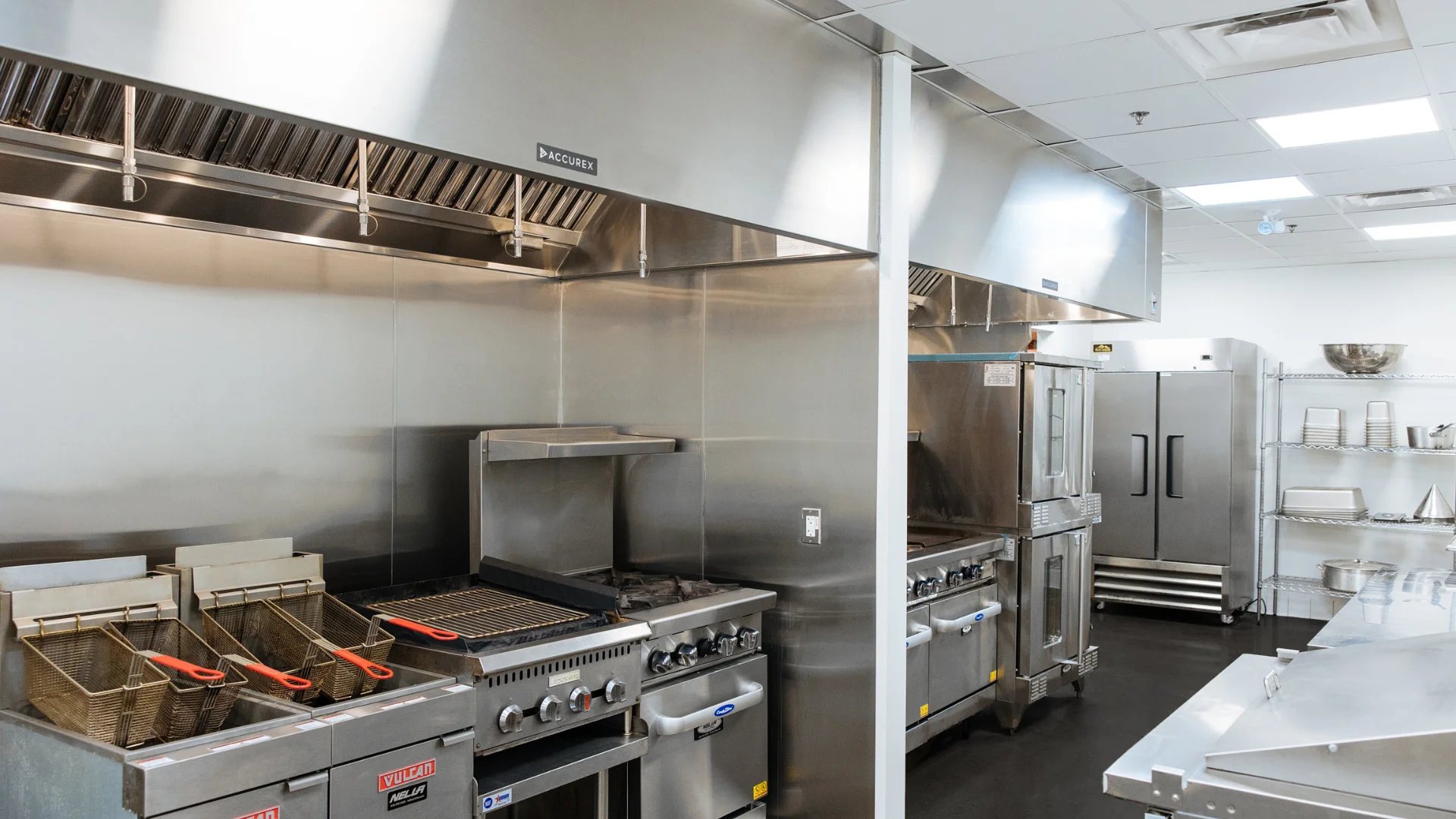 Modern commercial kitchen with stainless steel appliances