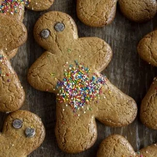 Gingerbread cookies decorated with colorful sprinkles