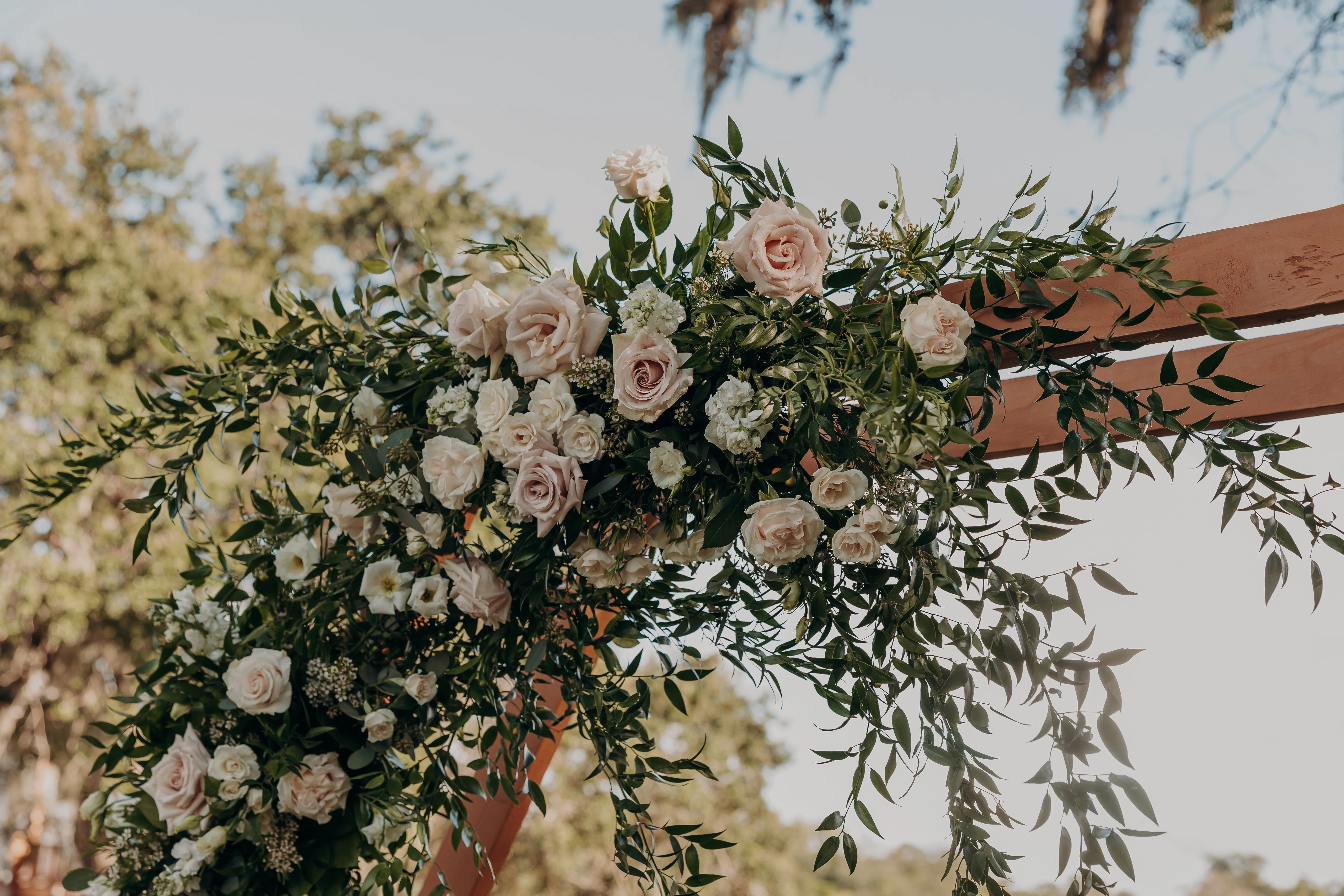 Elegant floral arch for a wedding ceremony