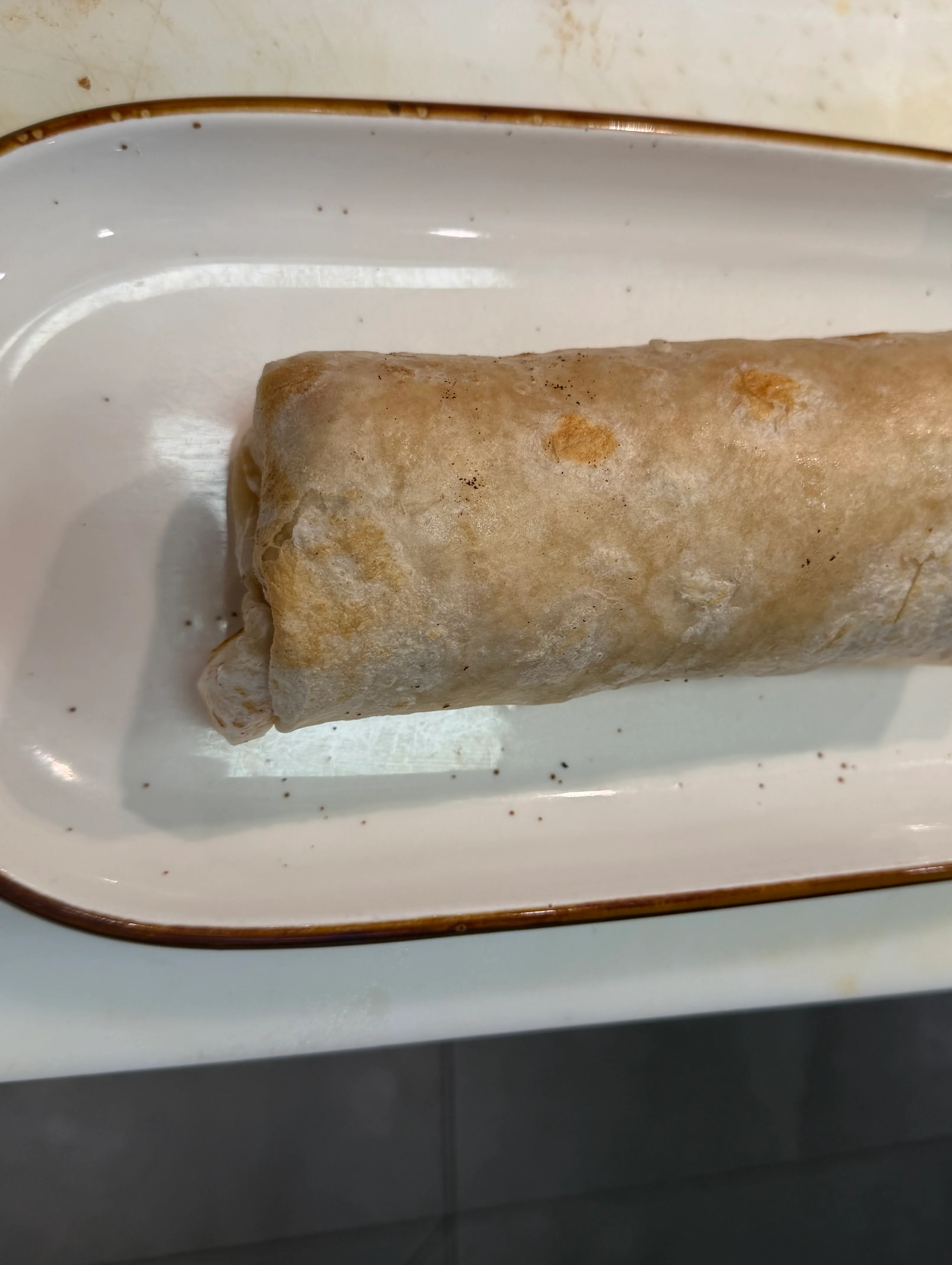 Delicious burrito wrapped in a tortilla