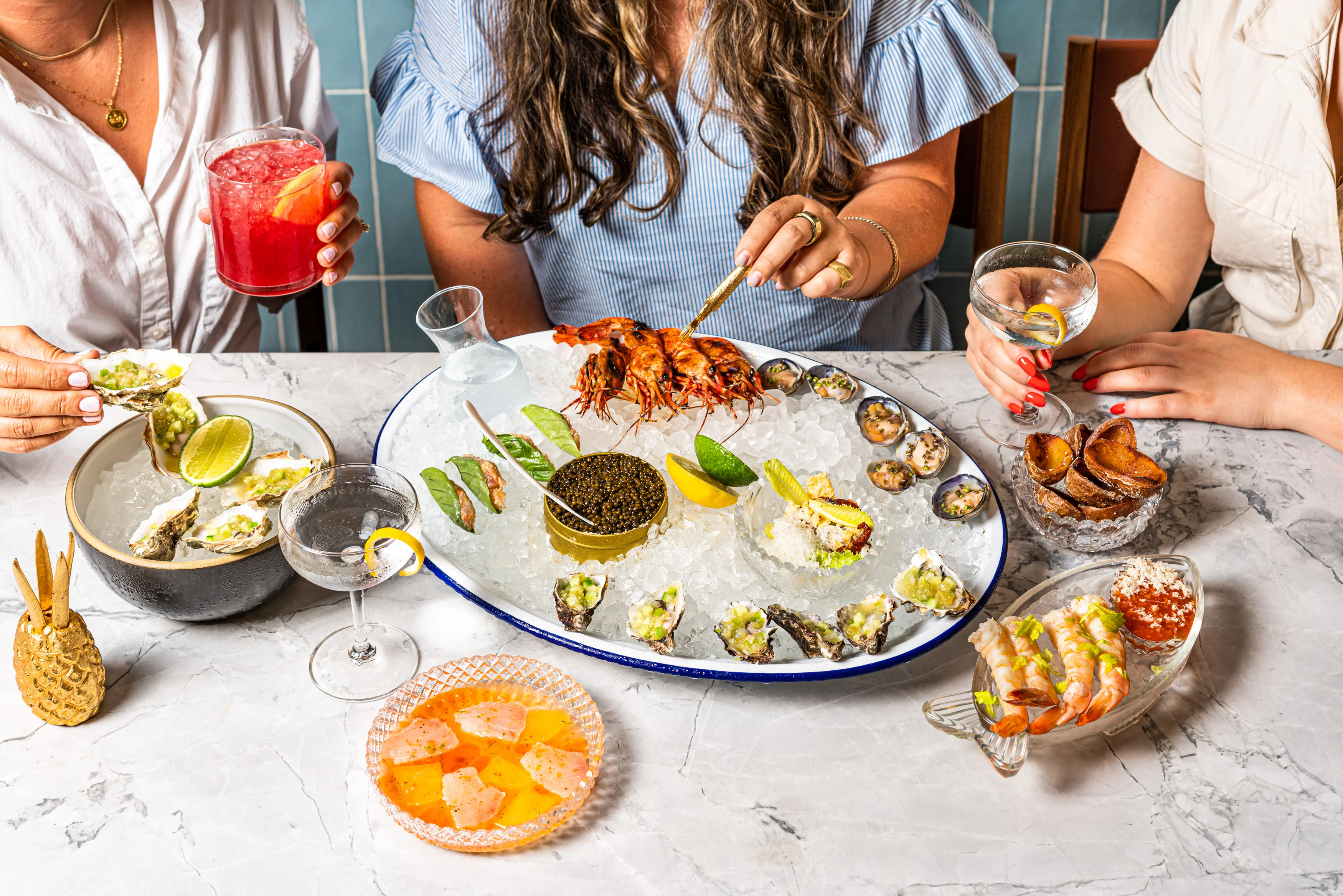 Seafood platter with oysters, shrimp, and caviar