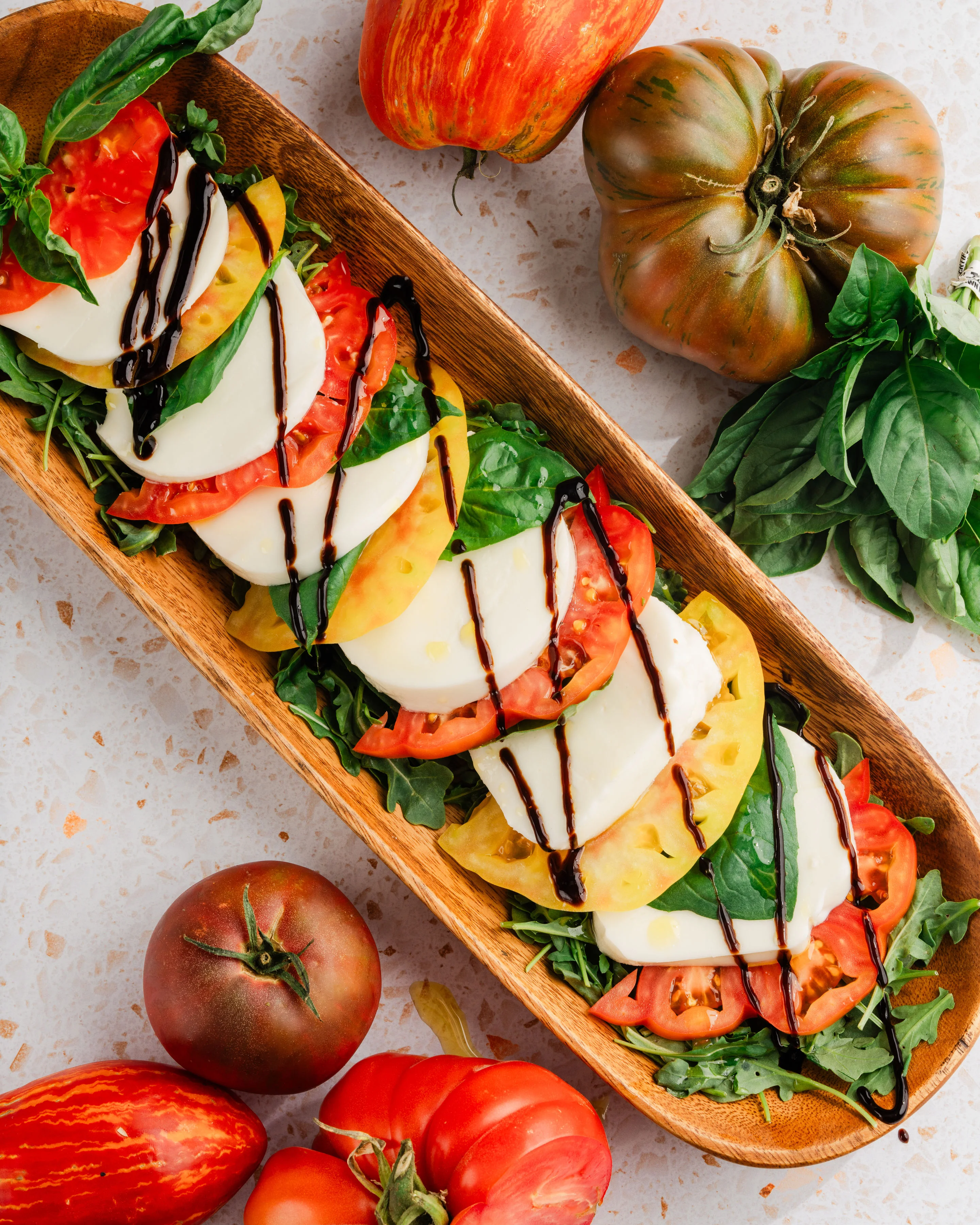 Caprese salad with fresh mozzarella and heirloom tomatoes