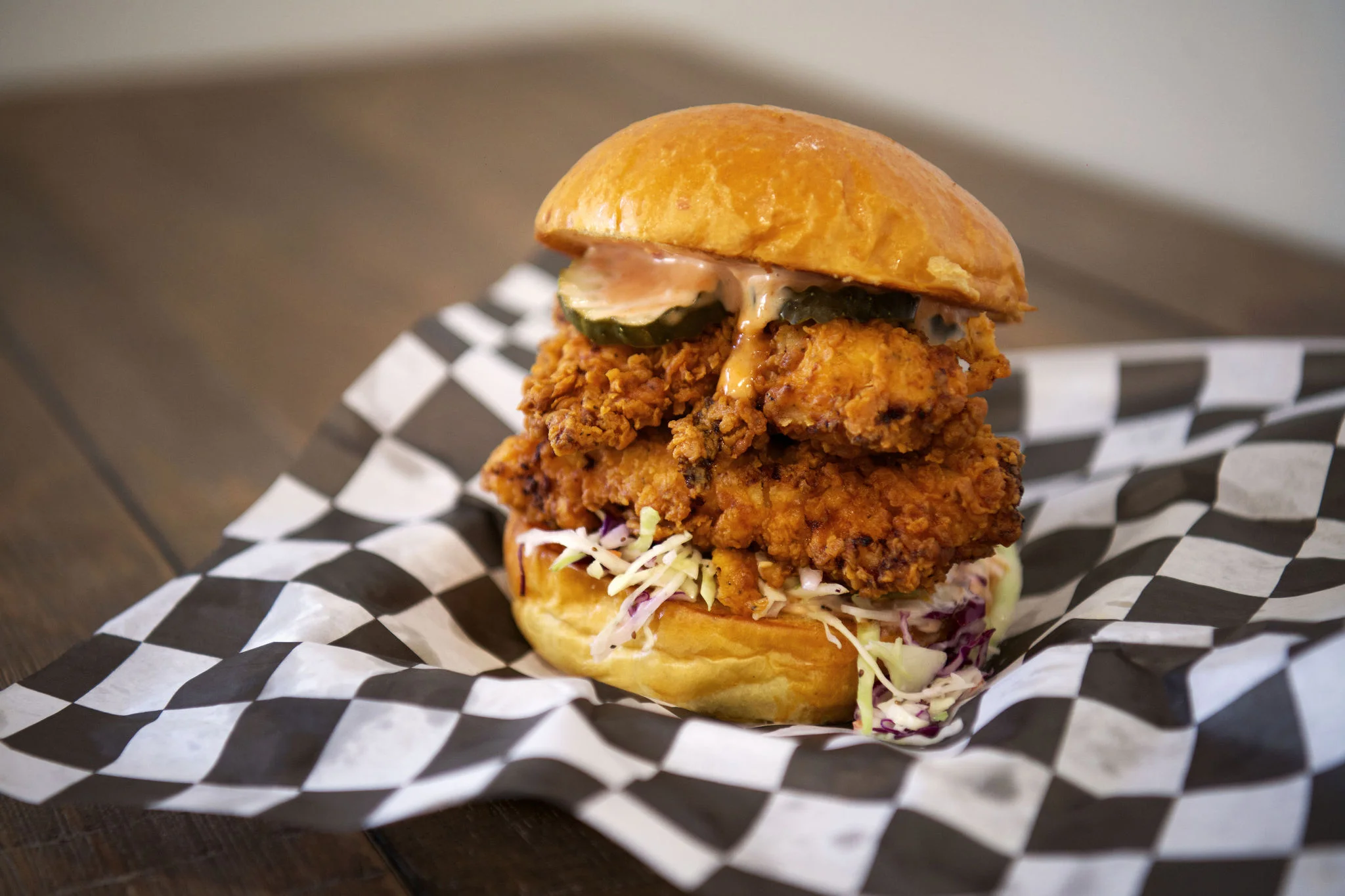 Crispy fried chicken sandwich with pickles and sauce