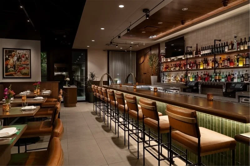 Stylish restaurant interior with a modern bar and seating