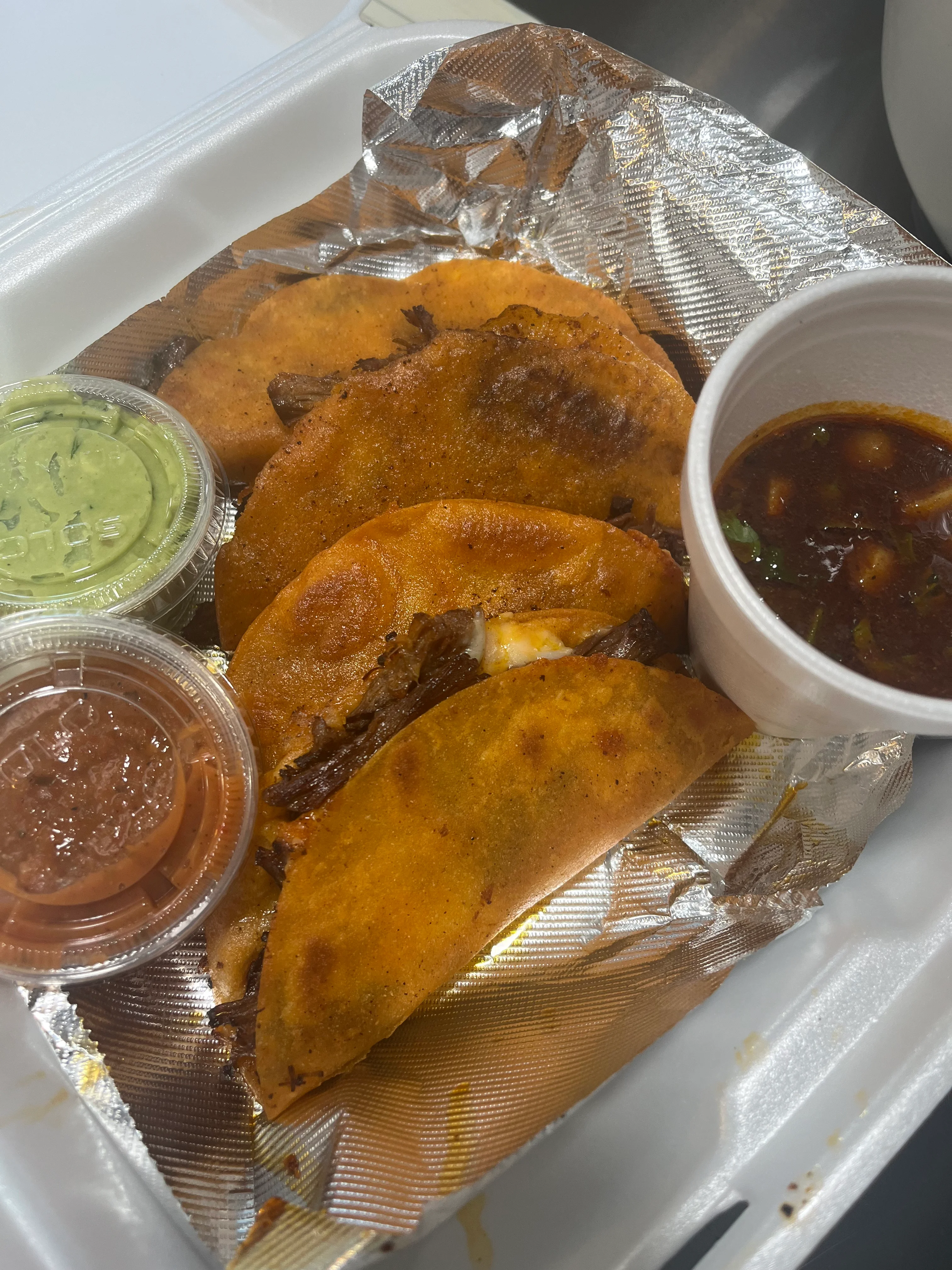 Delicious Mexican tacos with beef and salsas