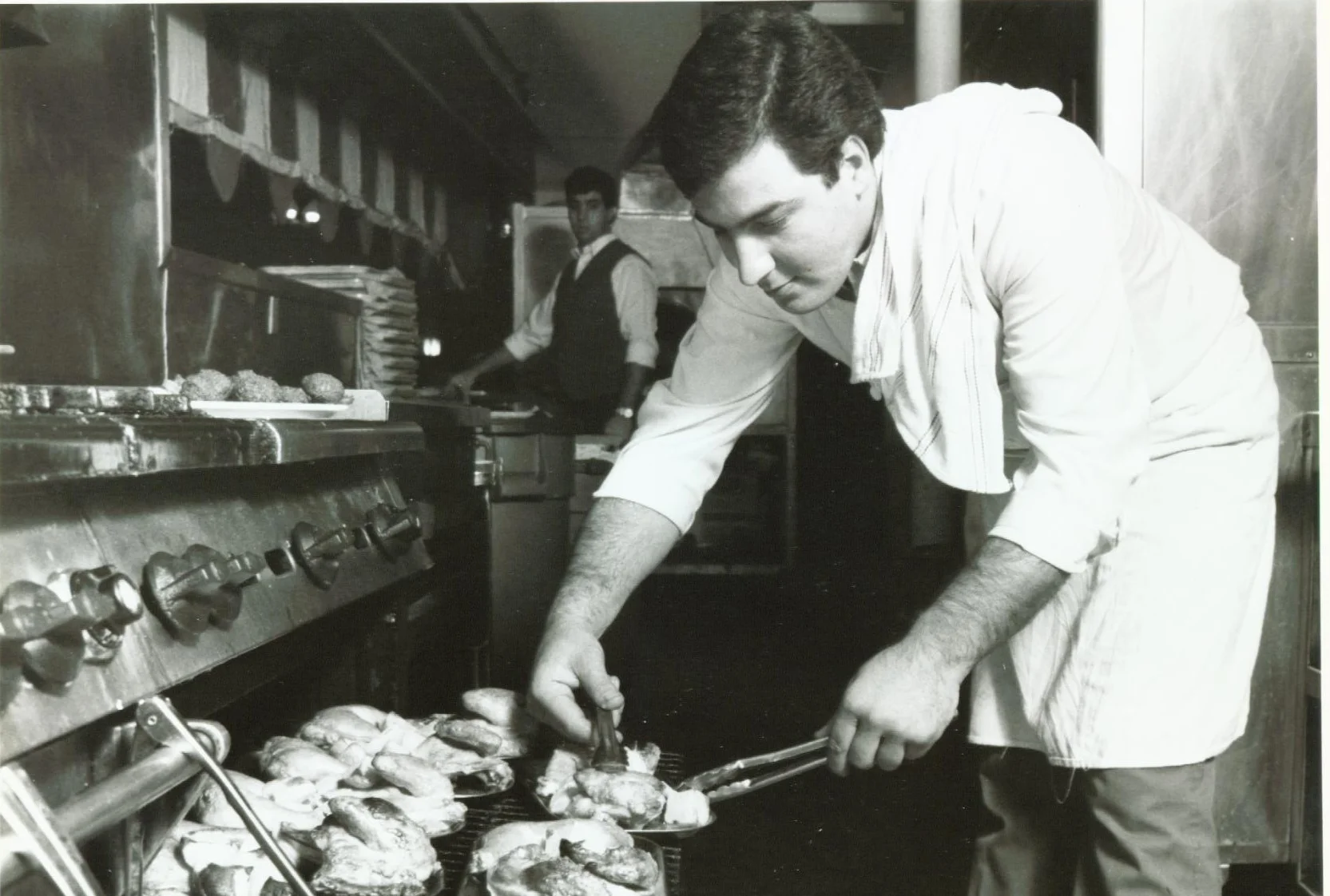 A restaurant chef preparing a dish