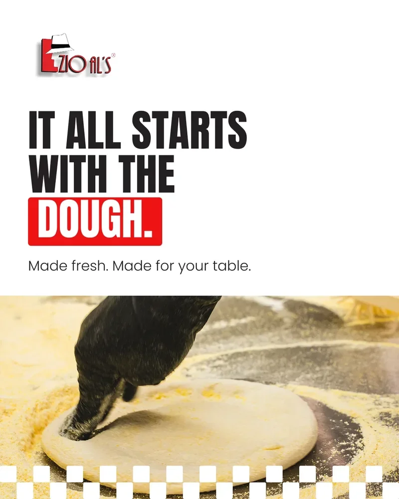 Zio Al's: It all starts with the dough. Made fresh, made for your table — a cook hand-shaping pizza dough 