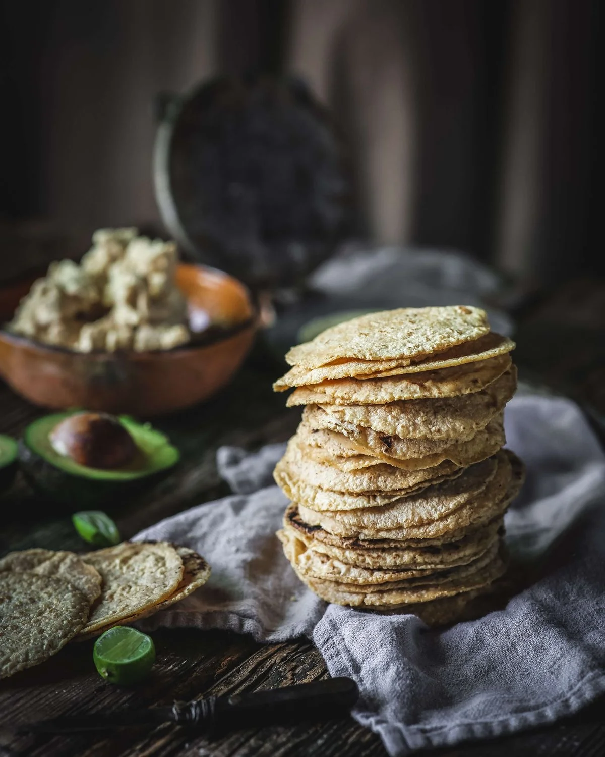 Stack of fresh Mexican tortillas on a rustic table