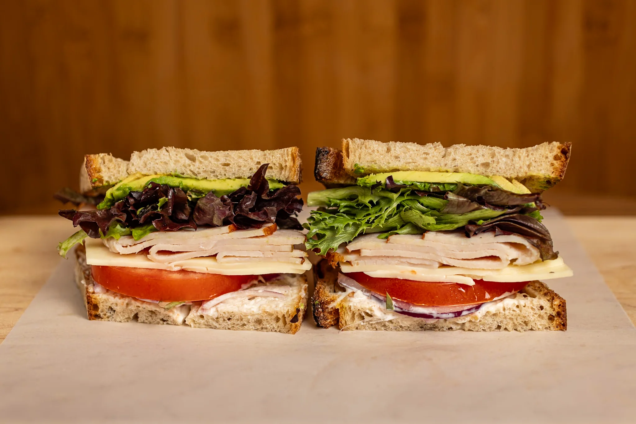Classic deli turkey sandwich on whole grain bread