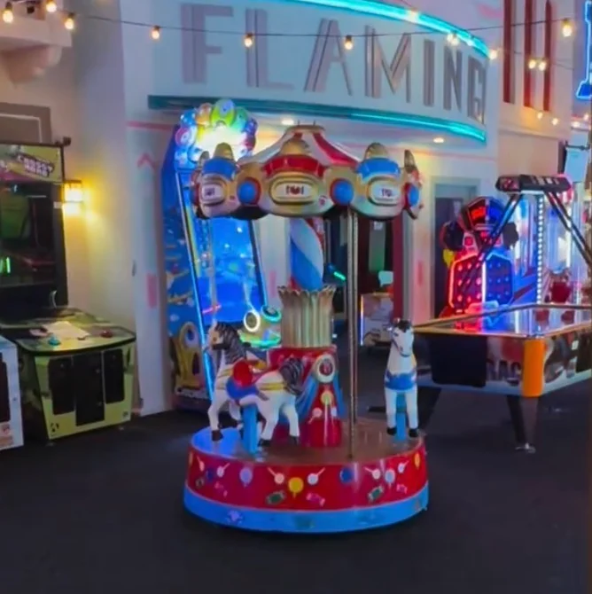 Colorful arcade interior with carousel ride and vintage airplane decor