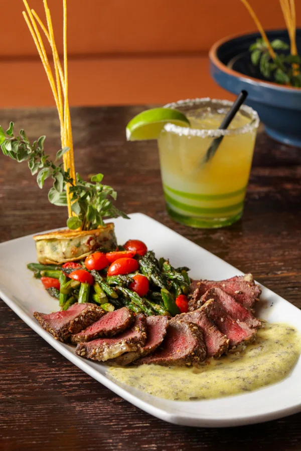 Delicious Chimayo dish served in a vibrant restaurant setting.
