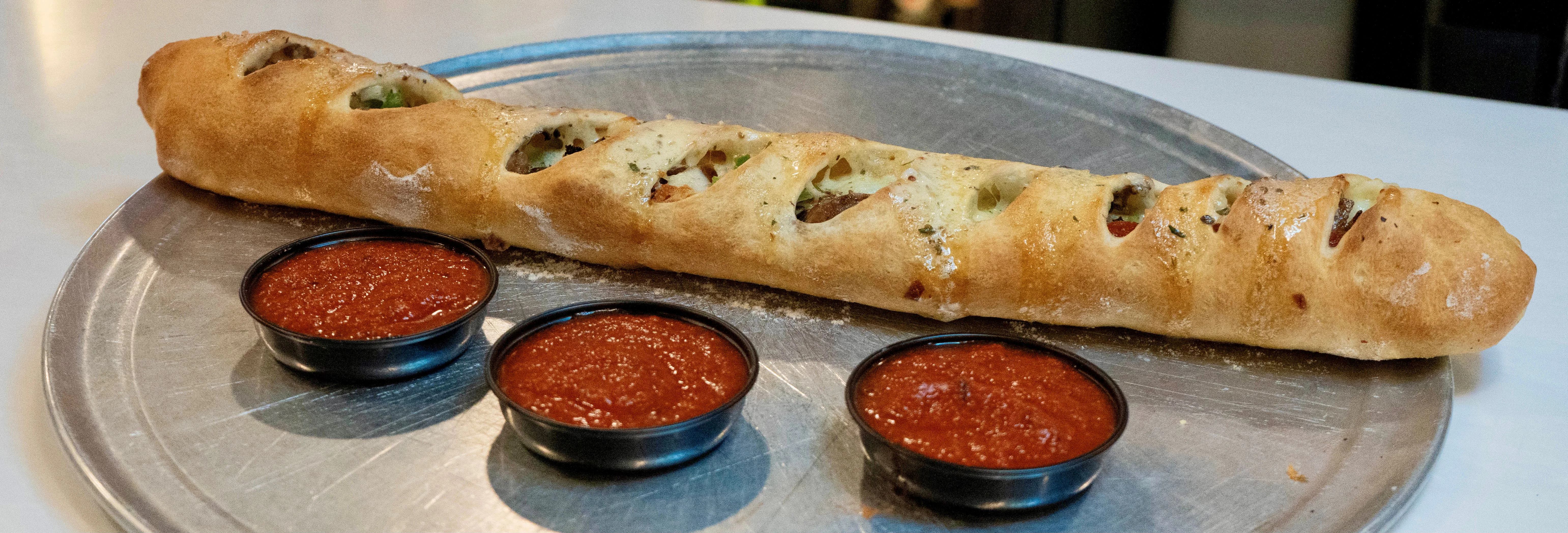  Large stromboli with 3 sides of marinara sauce. 