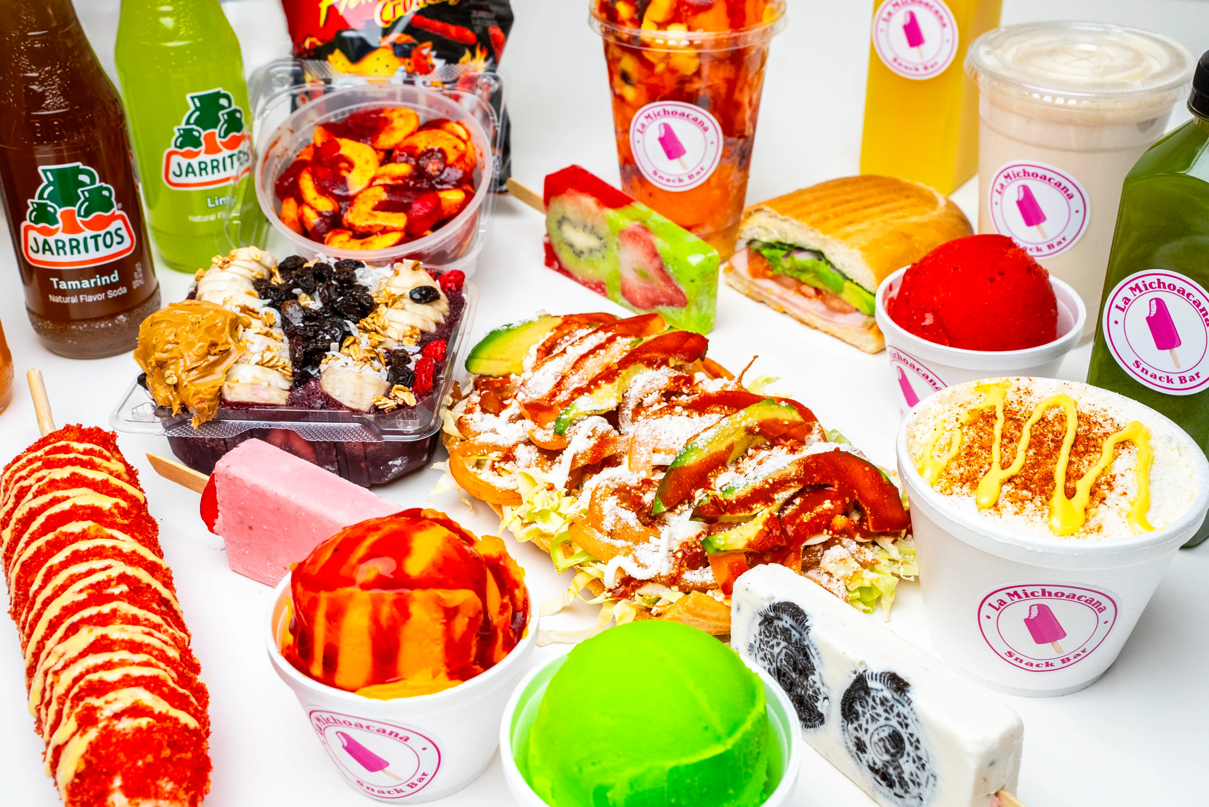 Colorful Mexican snacks and desserts at a vibrant snack bar