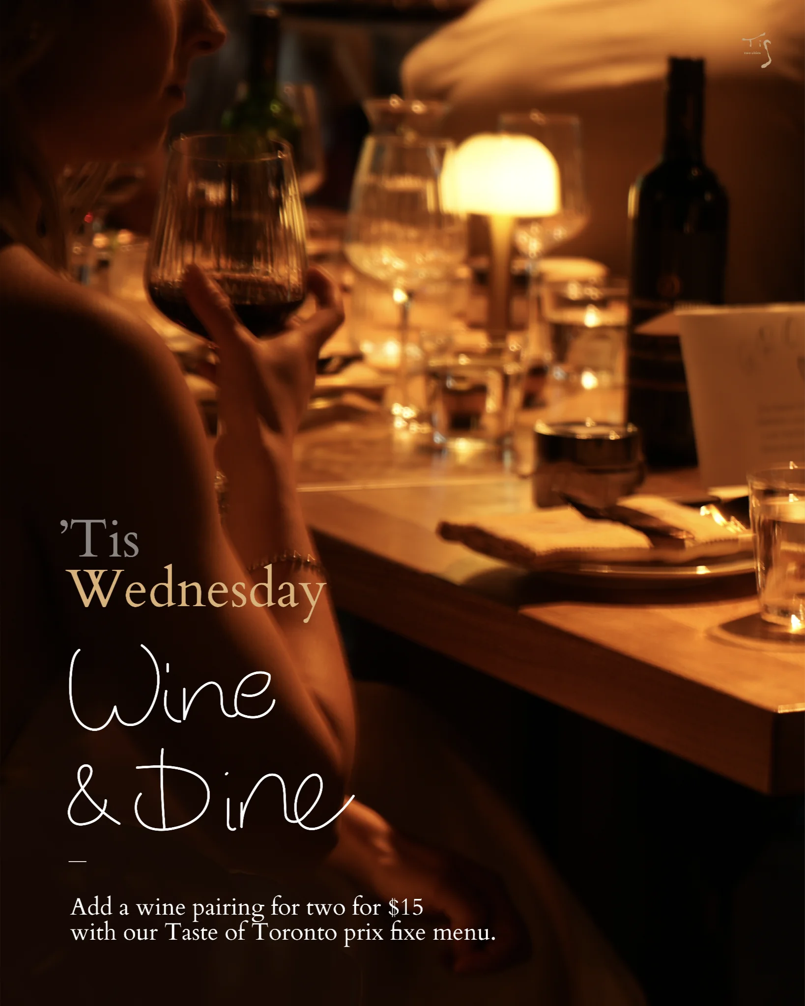 Candlelit restaurant table with wine glasses and an overlaid dinner promotion