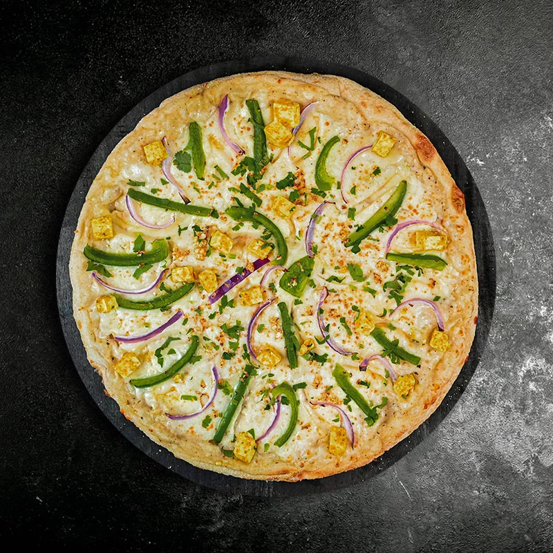 Vegetarian pizza with paneer and bell peppers
