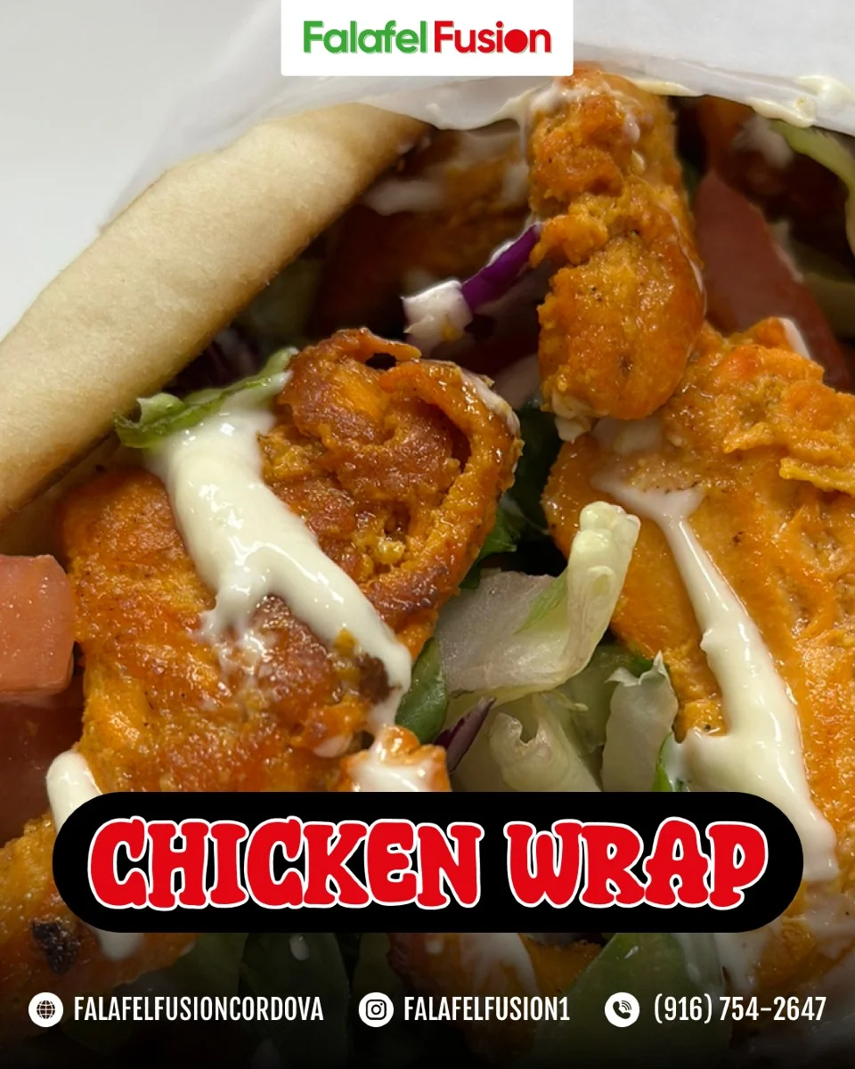Delicious chicken wrap with fresh vegetables in pita bread
