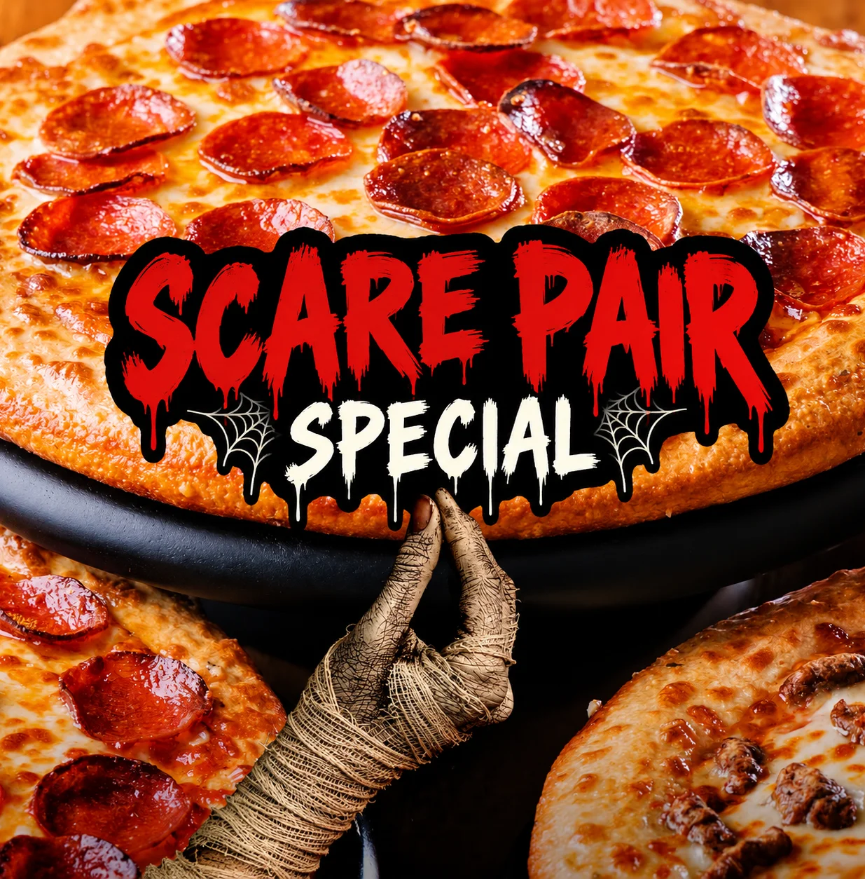 Pepperoni pizza with spooky Scare Pair Special promotional lettering