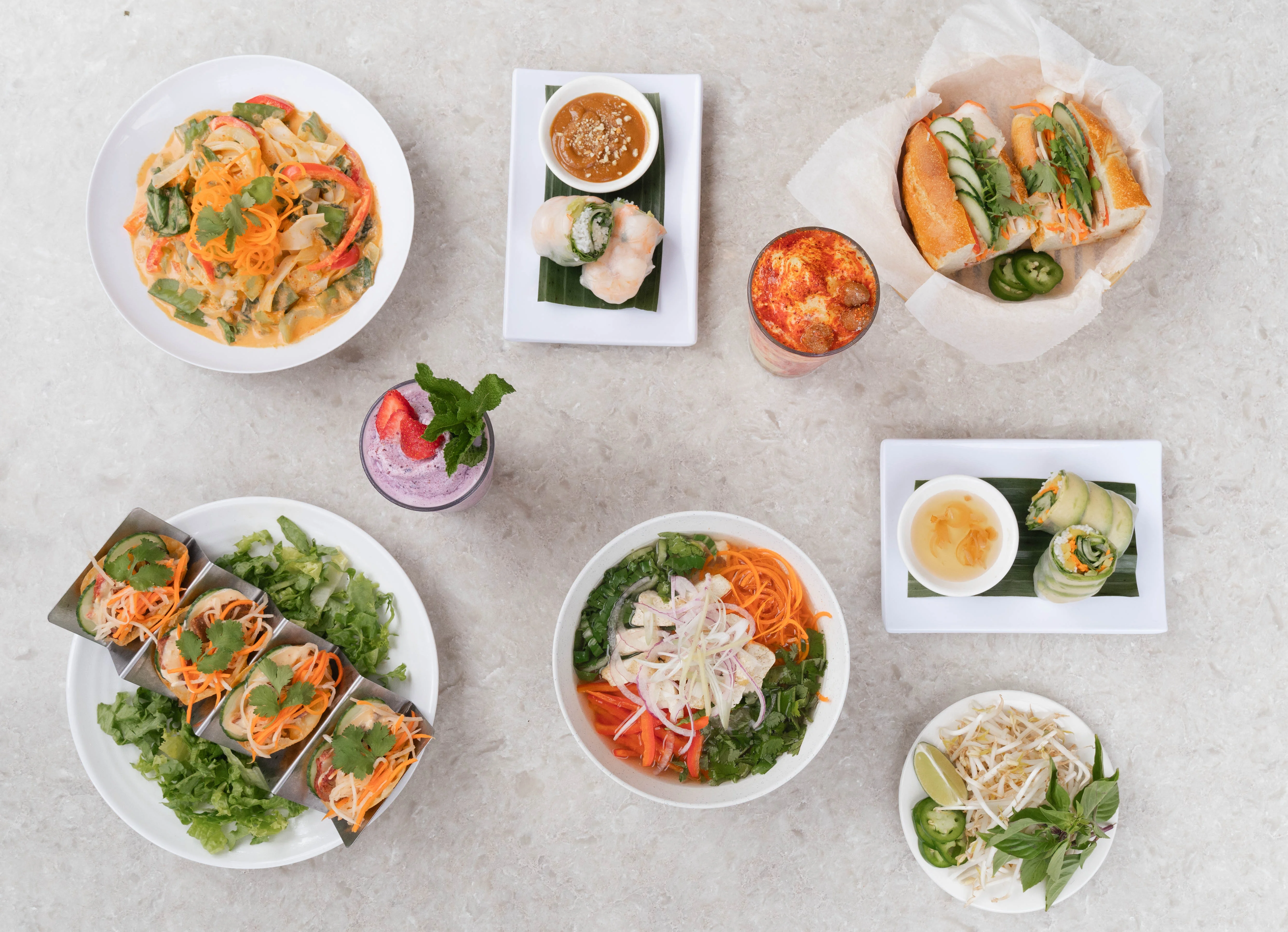 Assorted Vietnamese dishes including pho and banh mi