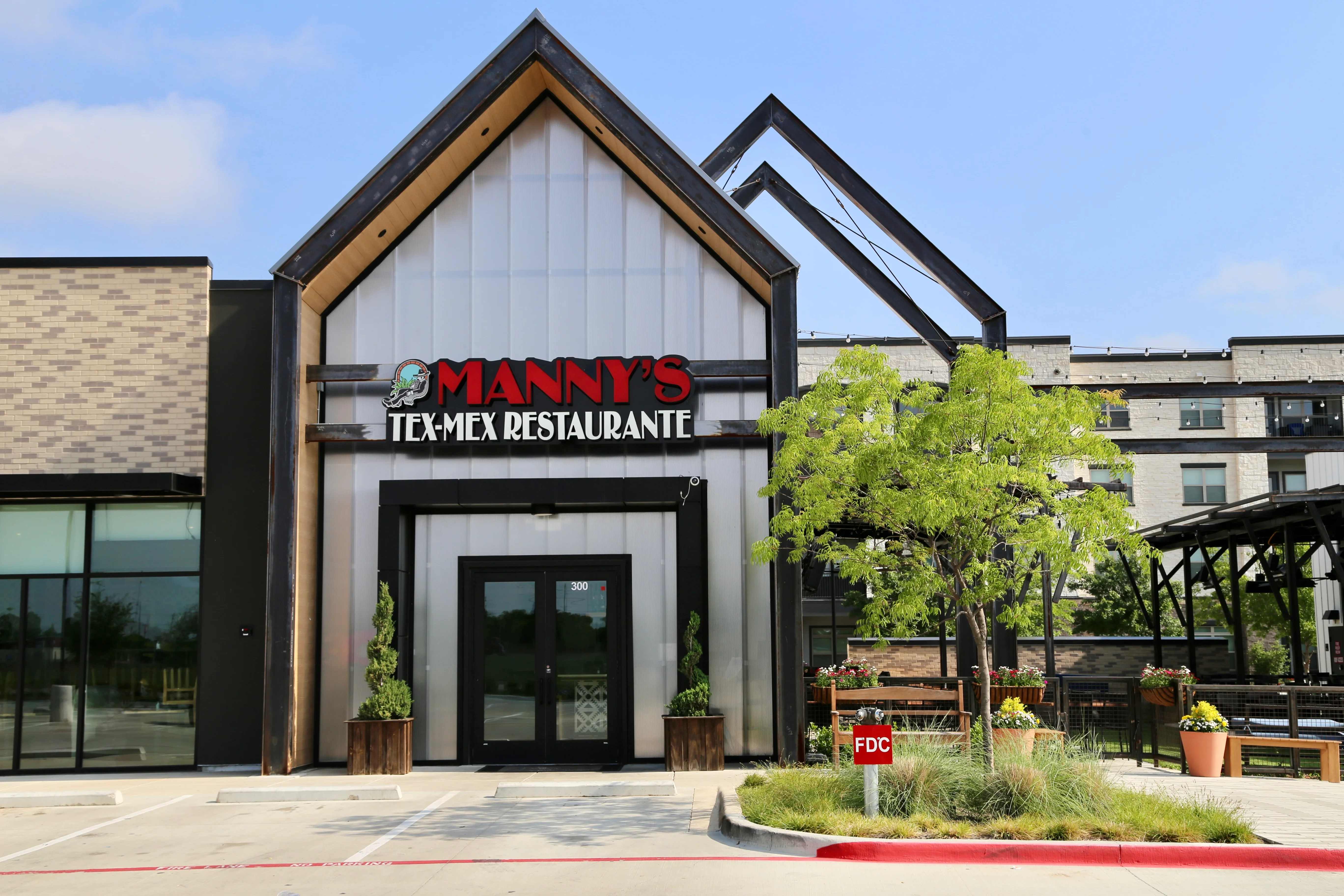 Exterior view of Manny's Tex-Mex Restaurante with modern architecture