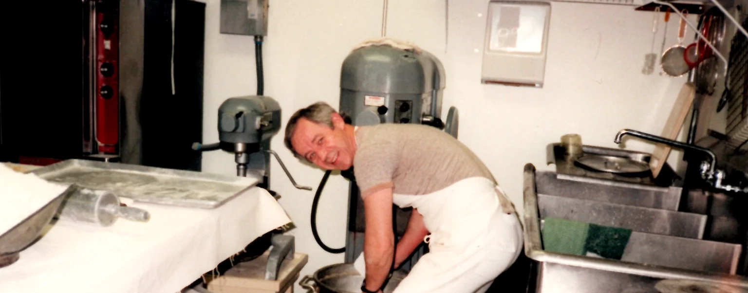 Chef preparing dough in a restaurant kitchen