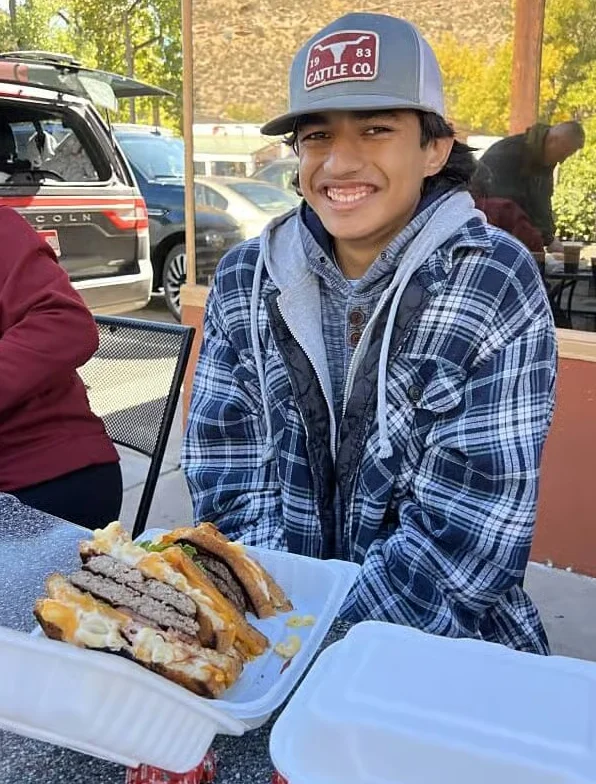 Delicious stacked burgers with toppings at a casual eatery