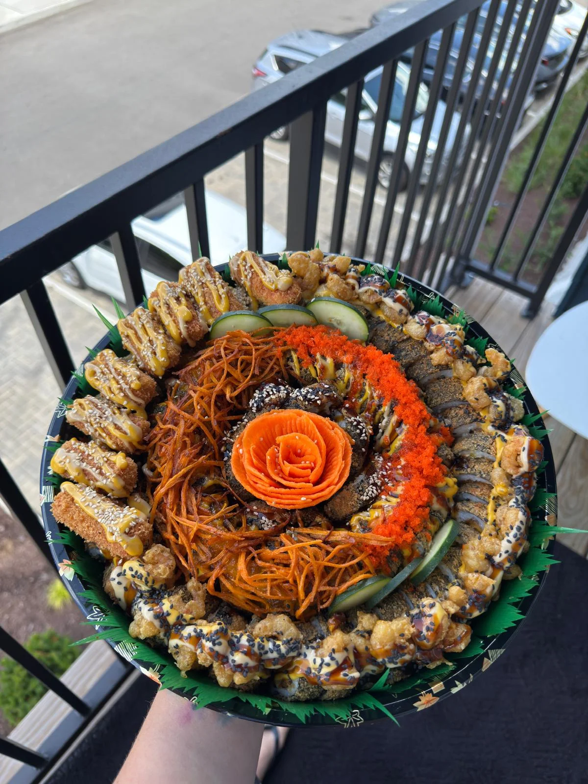 Colorful sushi platter with decorative garnishes