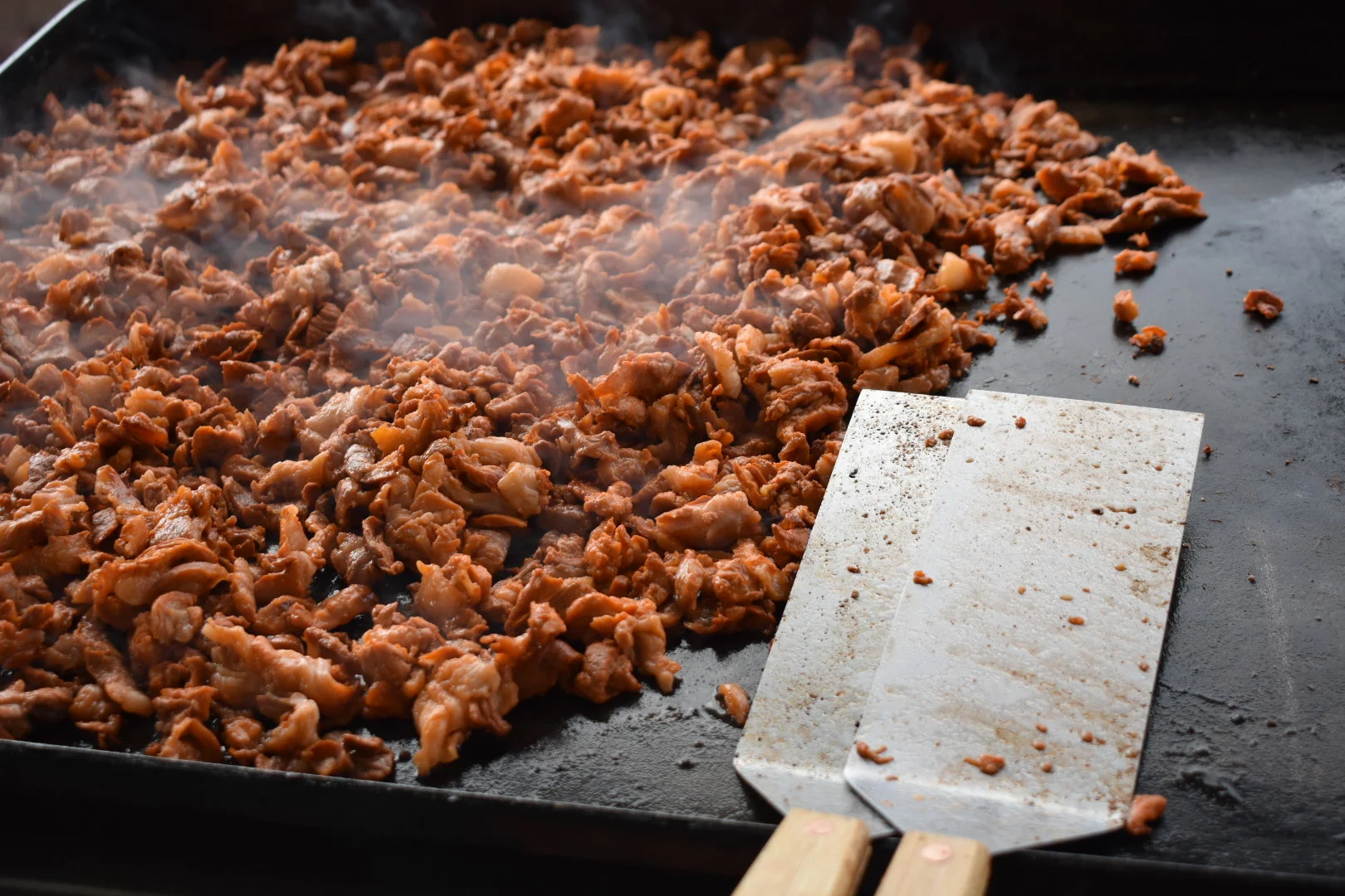 A restaurant chef preparing a dish