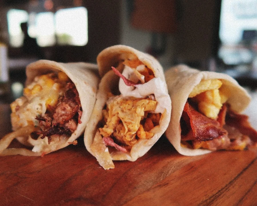 Breakfast burritos with bacon and eggs