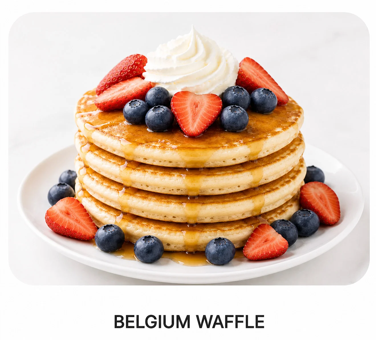 Fluffy Belgian waffles topped with berries and whipped cream