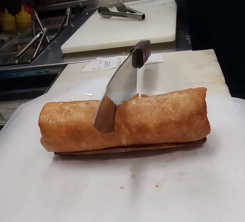 Golden-brown empanada ready for serving