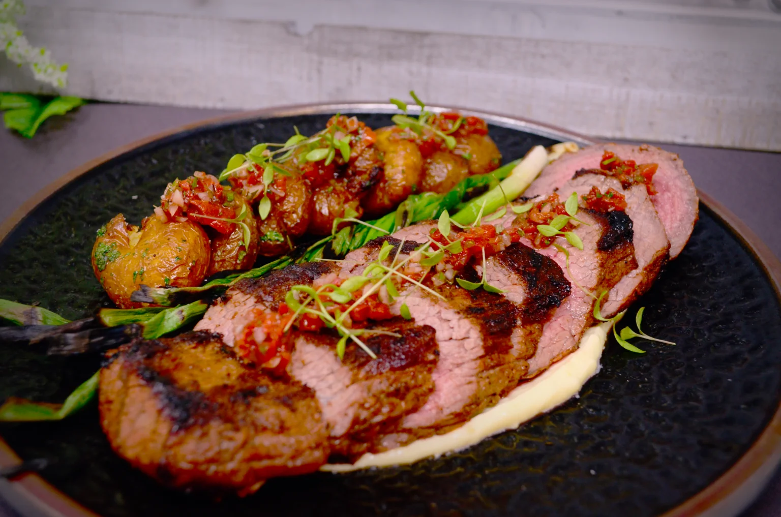 Grilled beef tenderloin with roasted potatoes